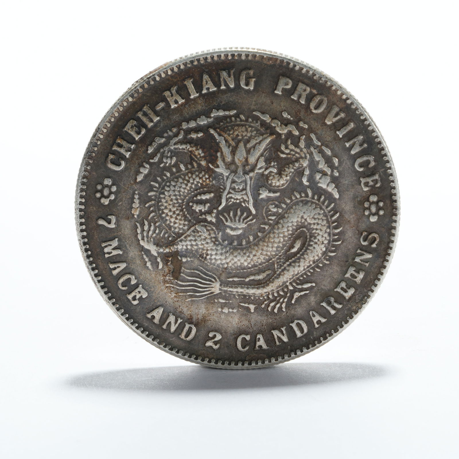 A SILVER DOLLAR COIN - 3
