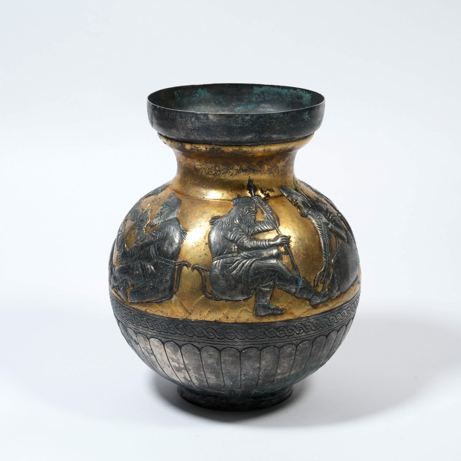 A SILVER-GILT SPOUTED VESSEL WITH FIGURE NARRATIVE DECORATION: Silver-Gilt Spouted Vessel with Figure Narrative Decoration