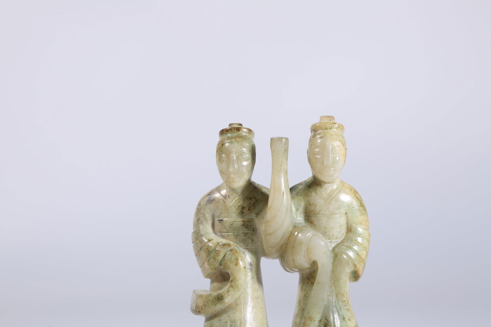 A ARCHAIC JADE DOUBLE-LINKED DANCING FIGURES - 2