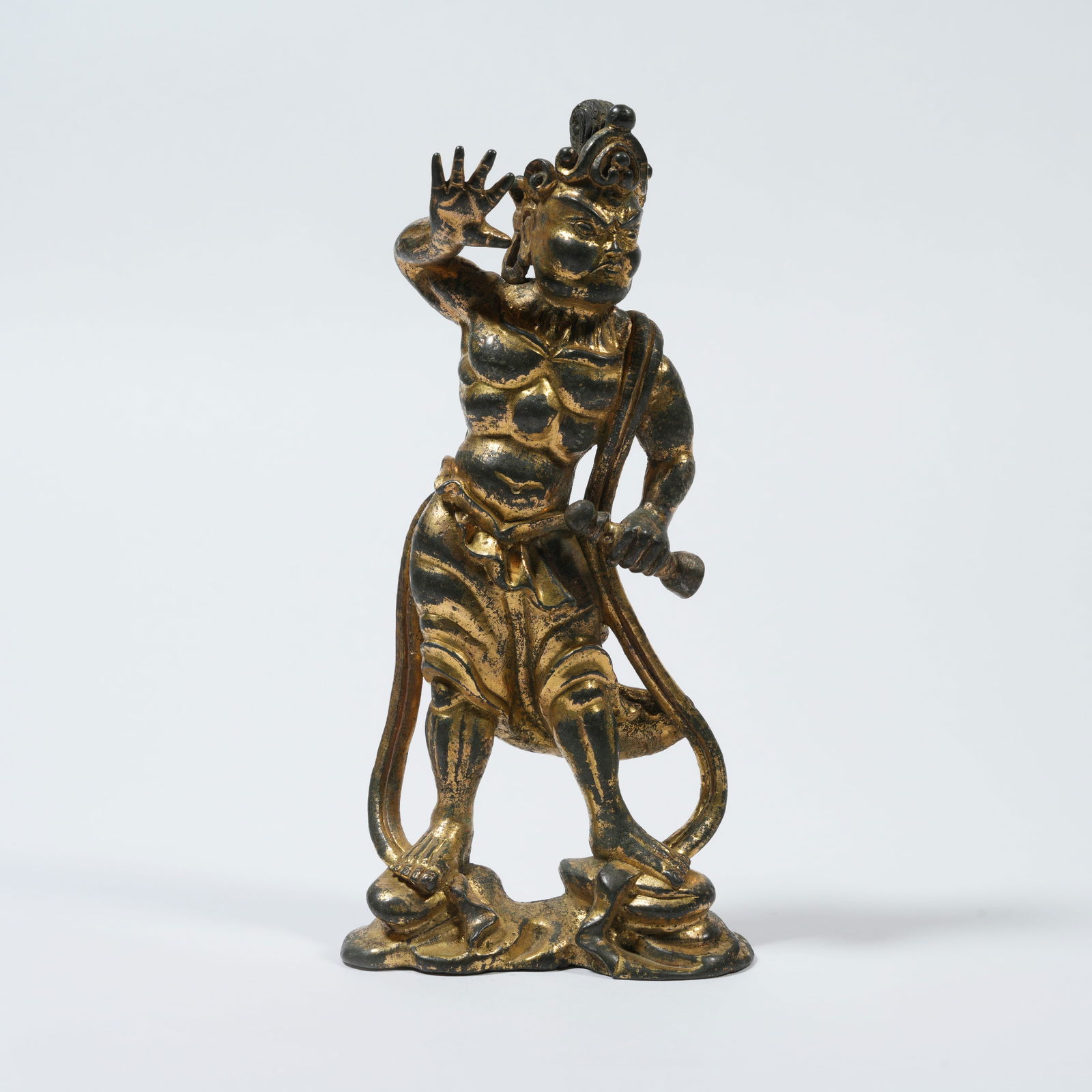A GILT-BRONZE FIGURE OF A GUARDIAN WARRIOR (VAJRAPANI): Gilt-Bronze Figure of a Guardian Warrior (Vajrapani)