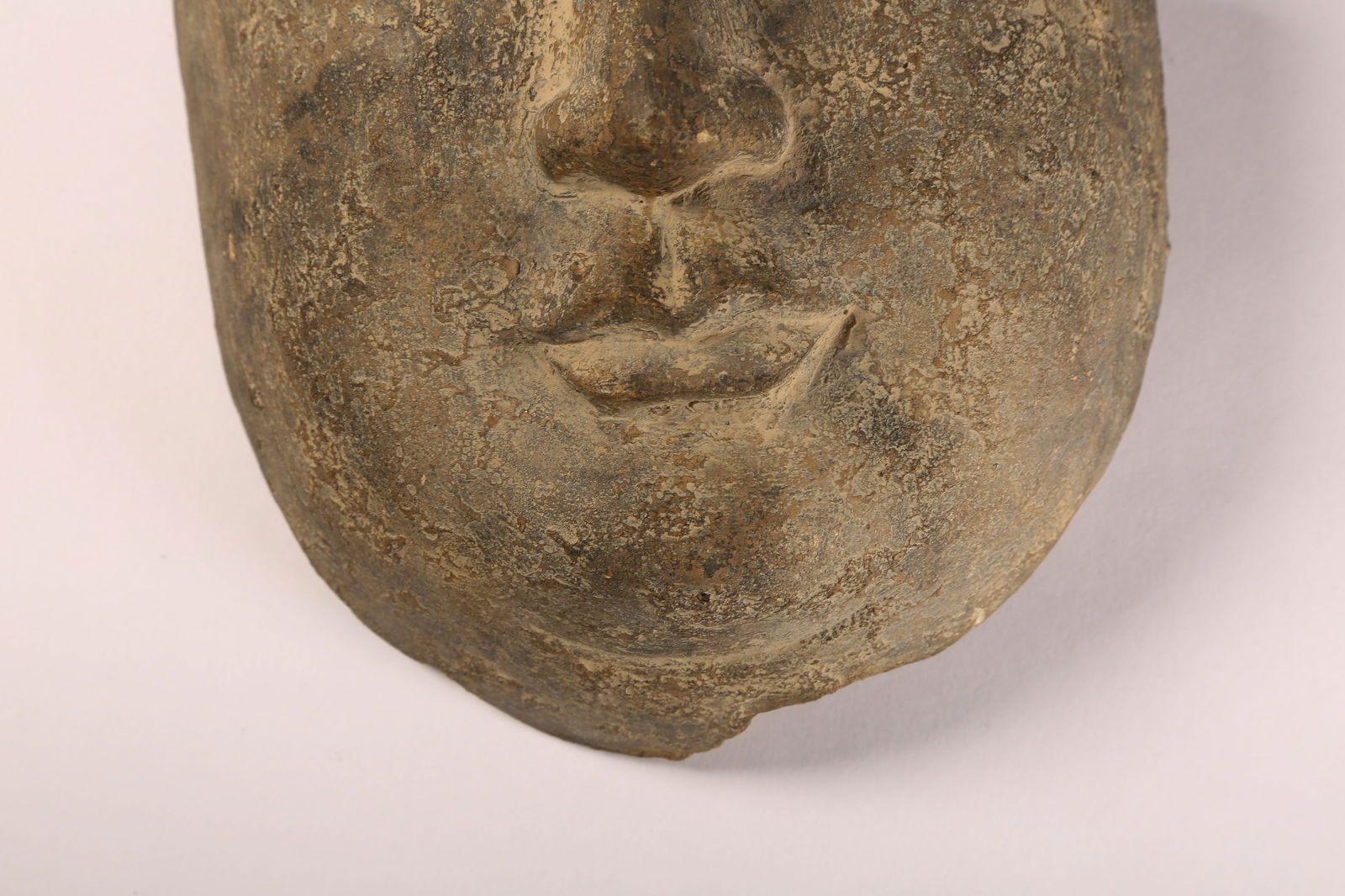 A BLUESTONE BUDDHIST FACE - 3