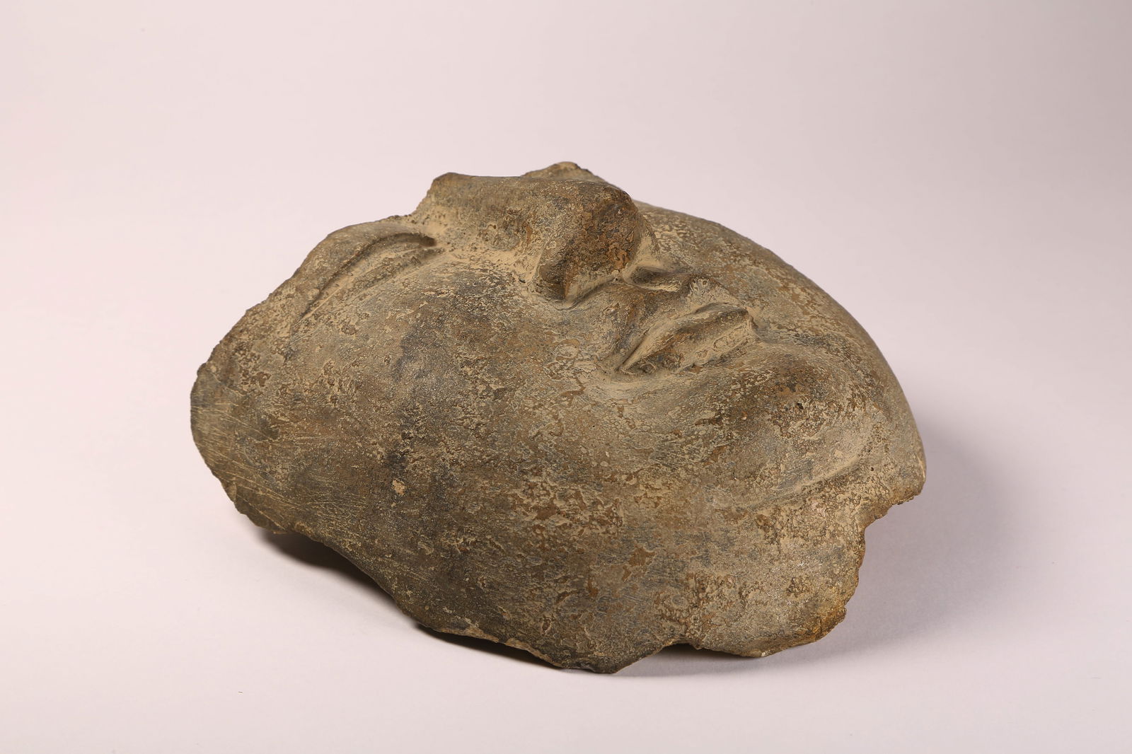 A BLUESTONE BUDDHIST FACE - 5