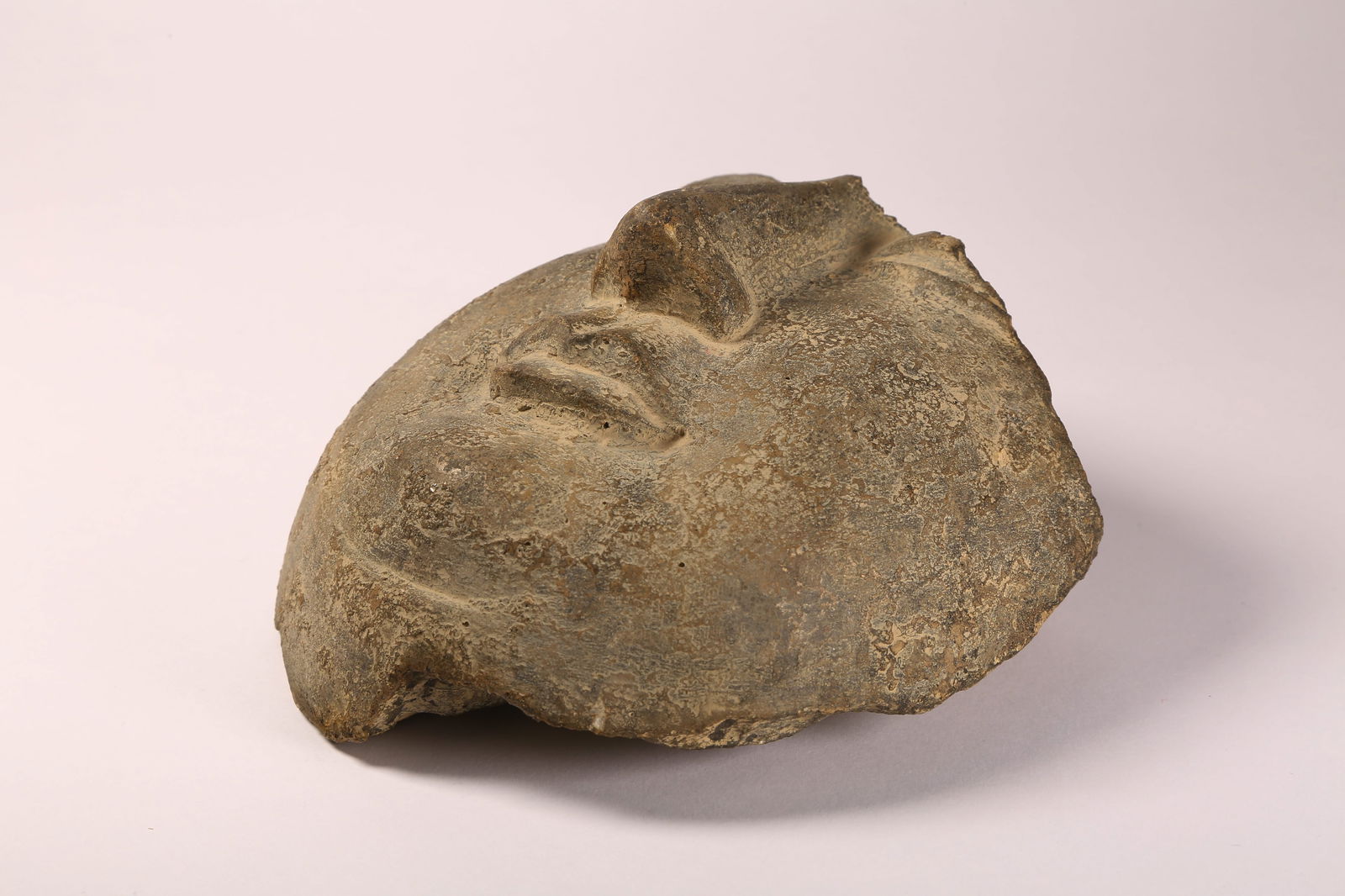 A BLUESTONE BUDDHIST FACE - 6