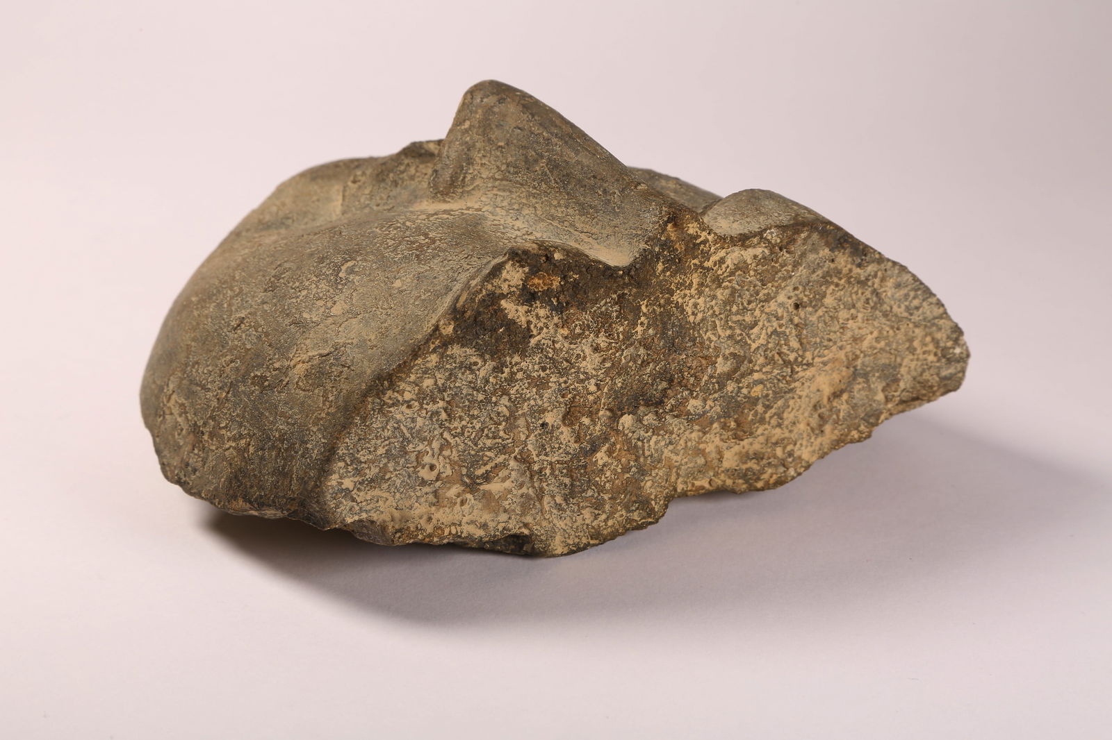 A BLUESTONE BUDDHIST FACE - 7