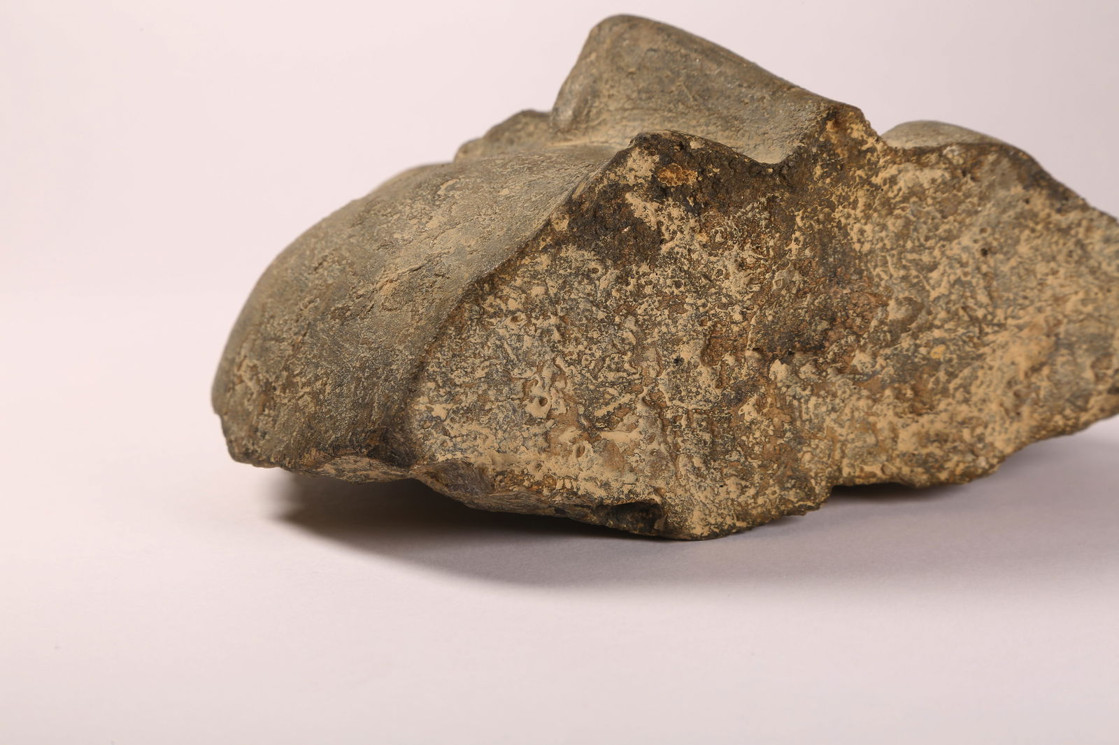 A BLUESTONE BUDDHIST FACE - 8