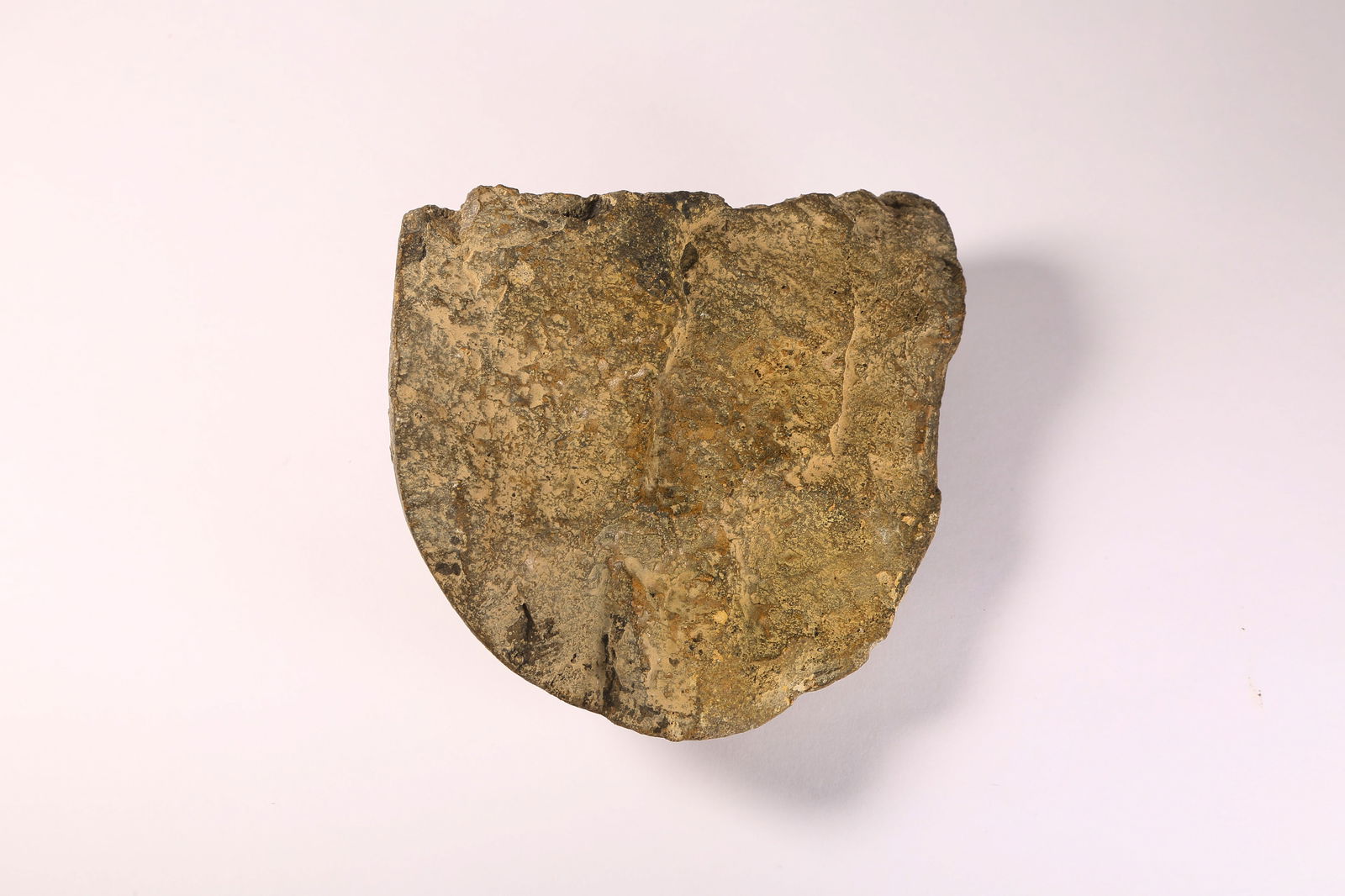 A BLUESTONE BUDDHIST FACE - 9