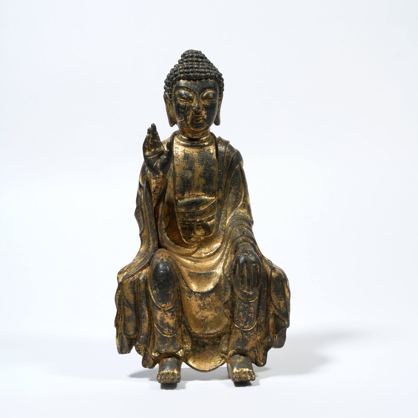 A GILT-BRONZE FIGURE OF SHAKYAMUNI BUDDHA (1 of 9)