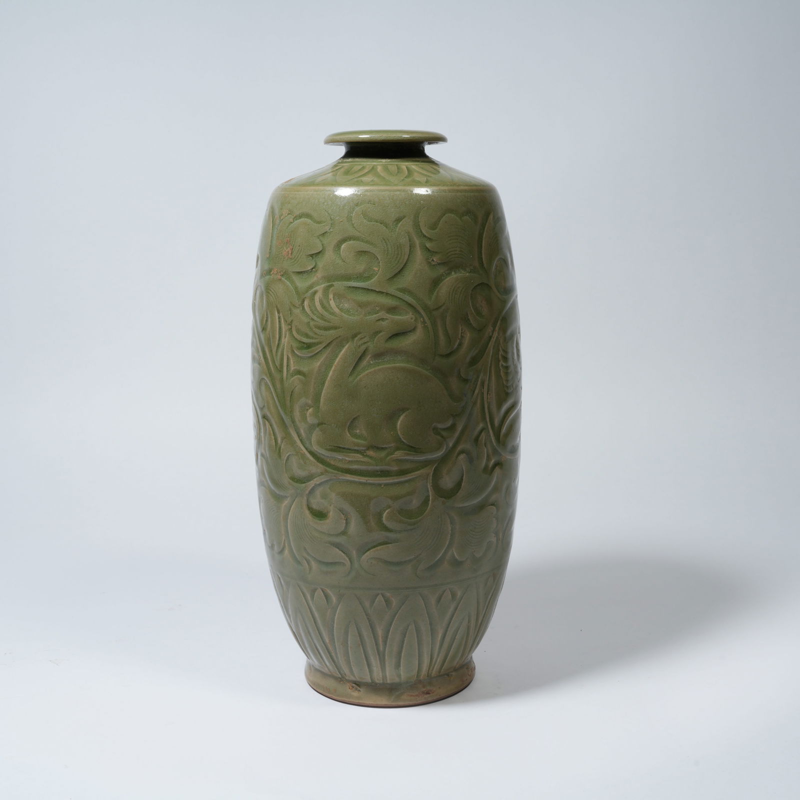 A YAOZHOU WARE INCISED VASE WITH AUSPICIOUS BEAST MOTIFS: Yaozhou Ware Incised Vase with Auspicious Beast Motifs