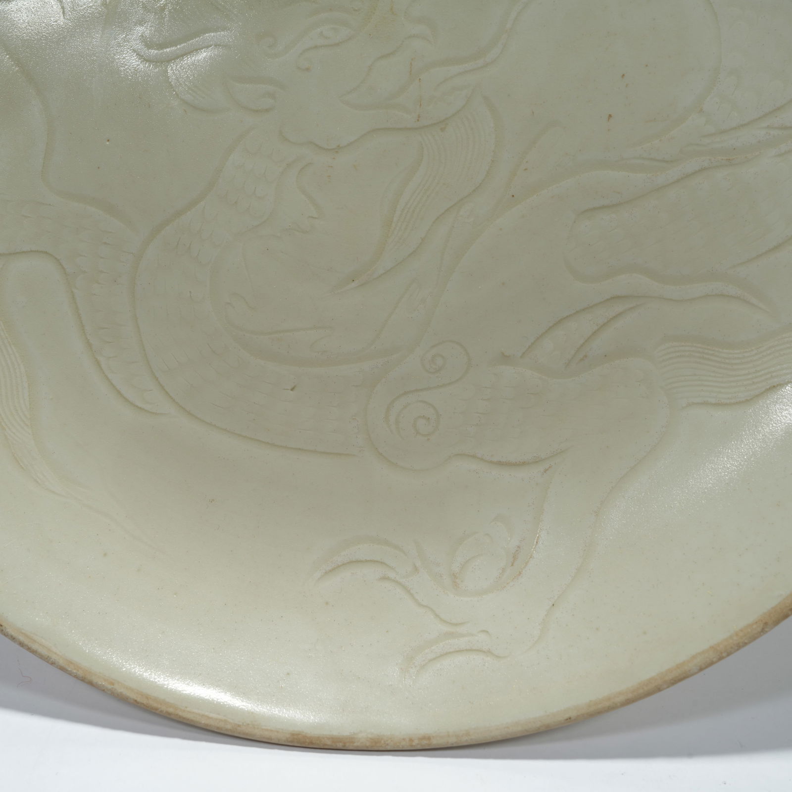 A DING KILN DRAGON-PATTERN DISH - 2