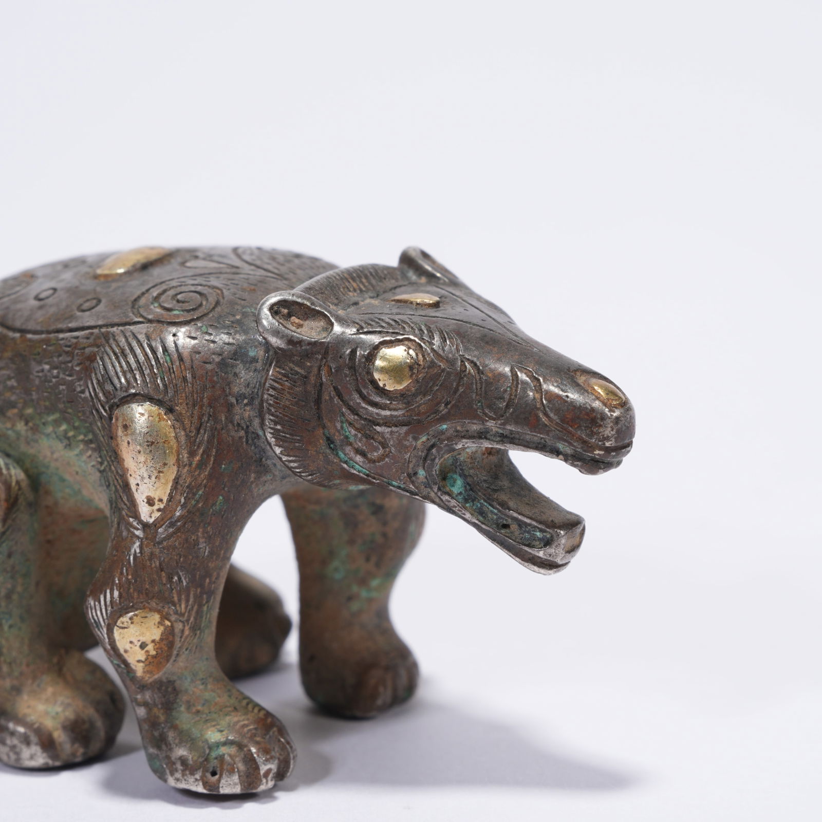 A SILVER BEAR FIGURINE - 2