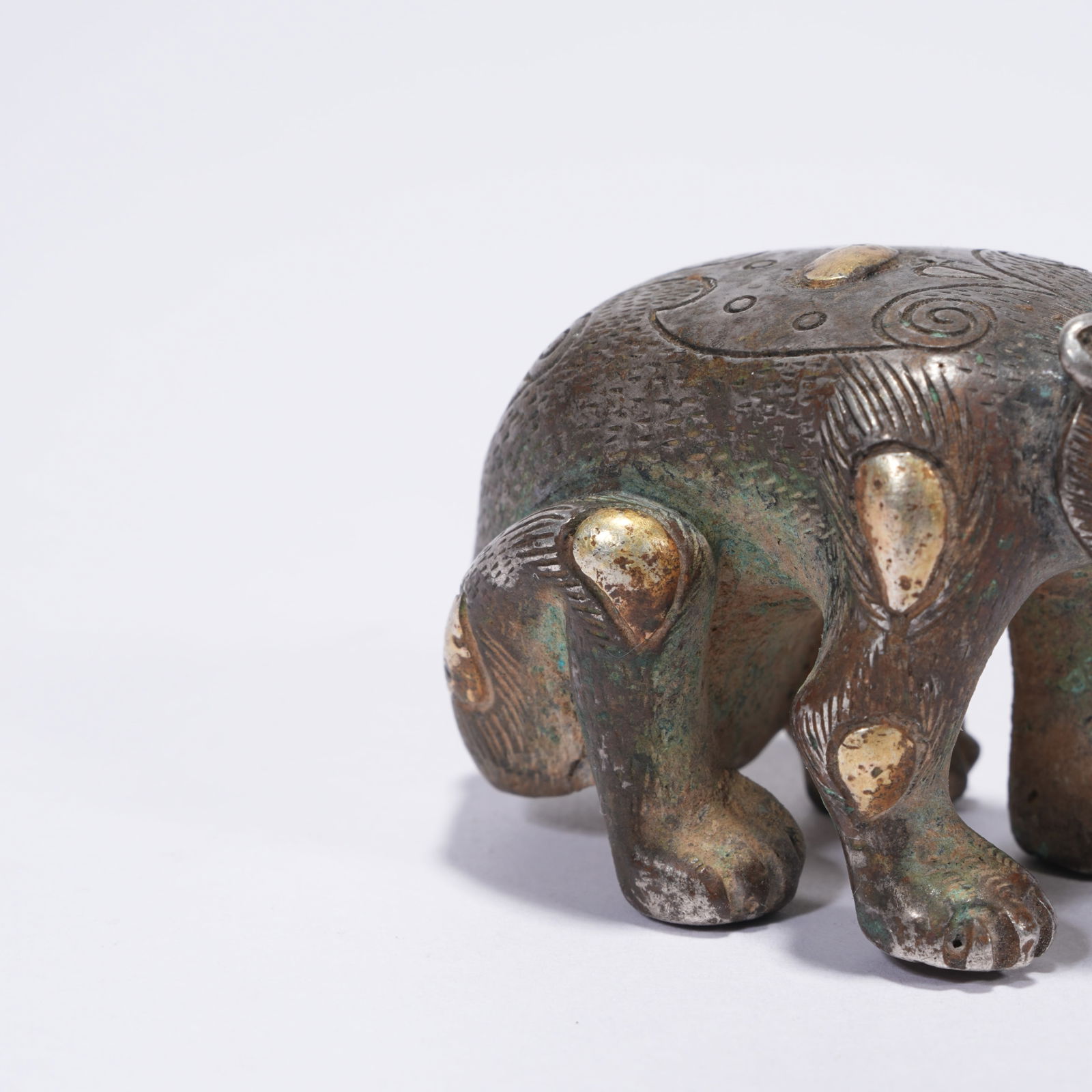 A SILVER BEAR FIGURINE - 3