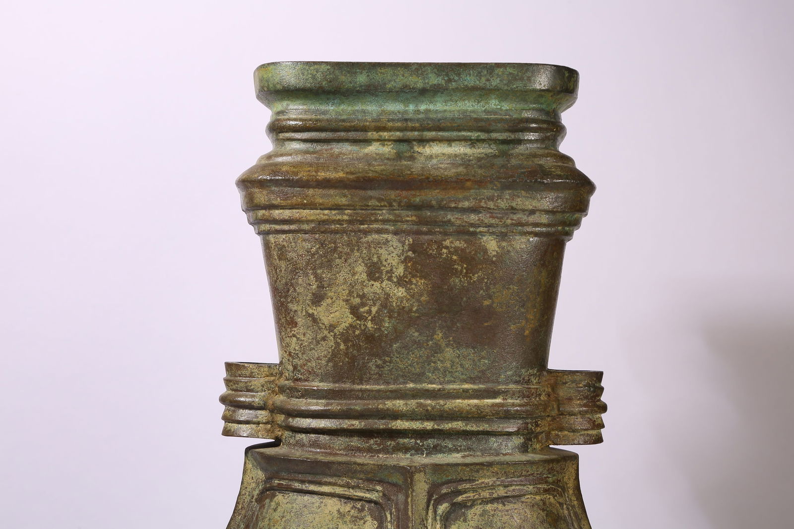 A BRONZE FLAT-HANDLED HU - 2