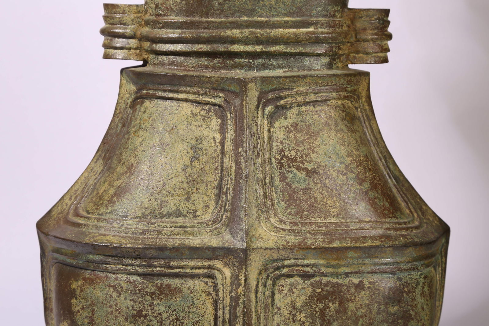 A BRONZE FLAT-HANDLED HU - 3