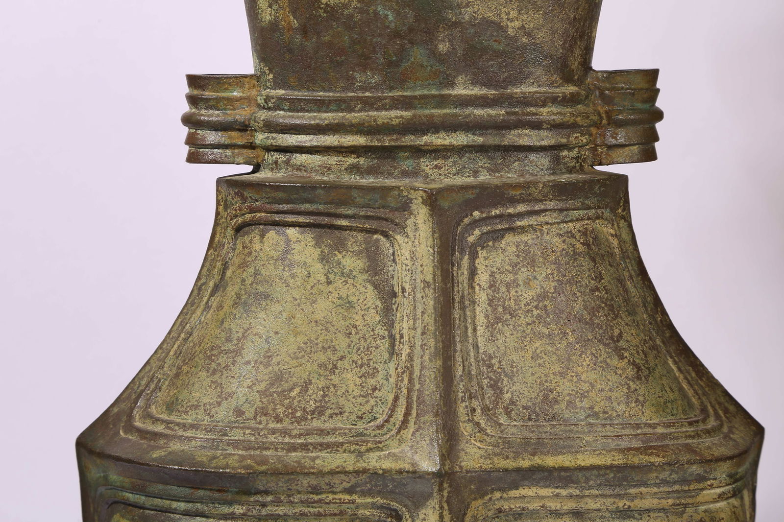 A BRONZE FLAT-HANDLED HU - 8