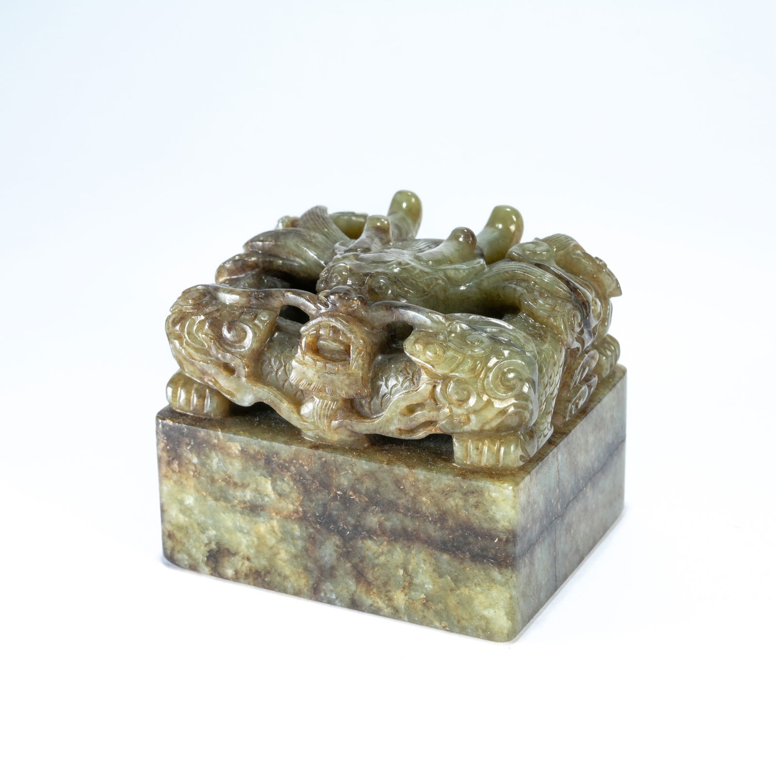 A HETIAN JADE CARVED SEAL WITH DRAGON KNOB: Hetian Jade Carved Seal with Dragon Knob