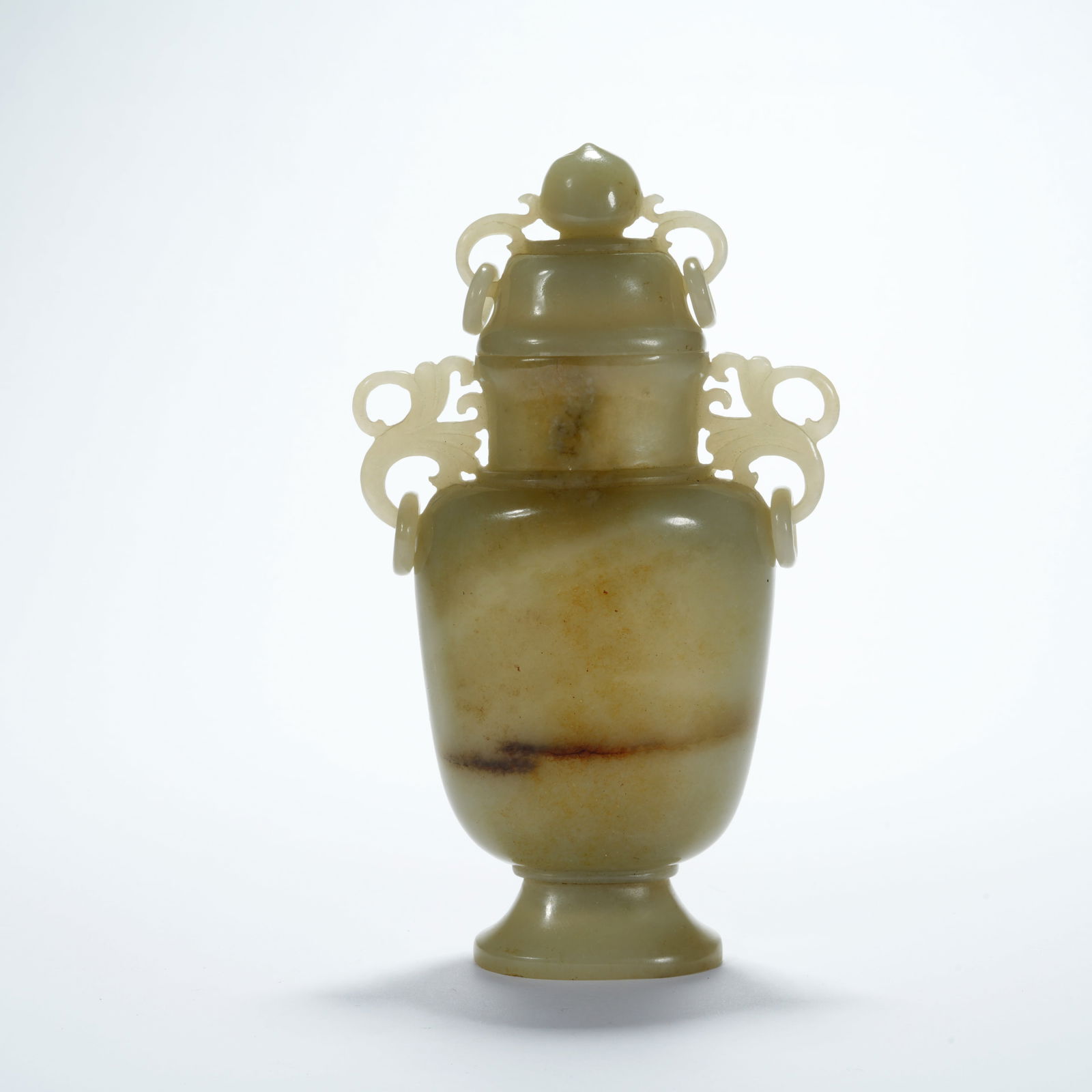 A HETIAN JADE DOUBLE-HANDLED COVERED VASE: Hetian Jade Double-Handled Covered Vase