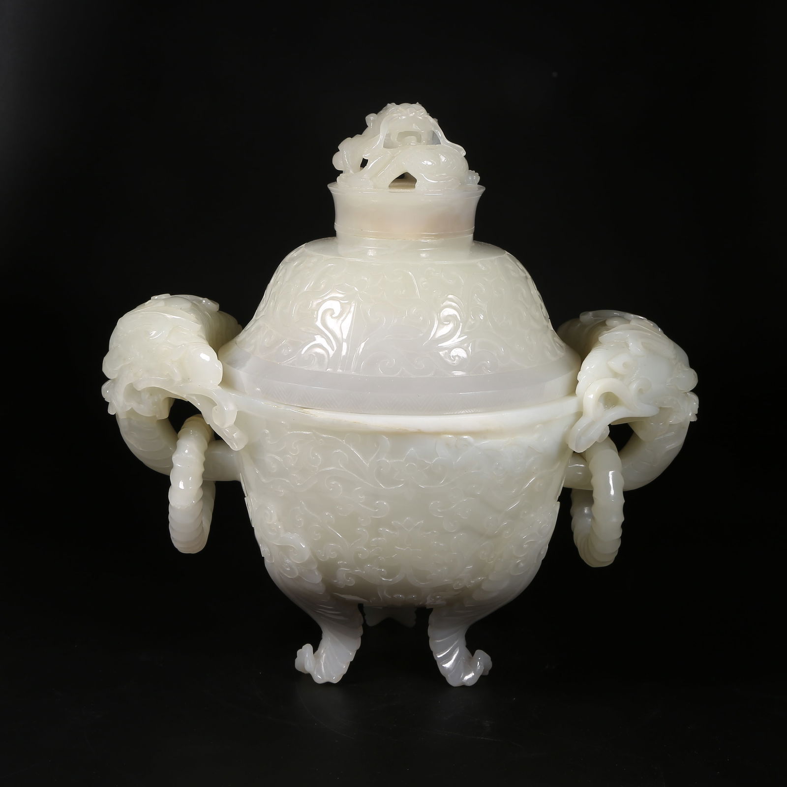 A HETIAN JADE COVERED CENSER WITH BAOXIANG FLORAL MOTIF AND BEAST HANDLES: Hetian jade covered censer with baoxiang floral motif and beast handles
