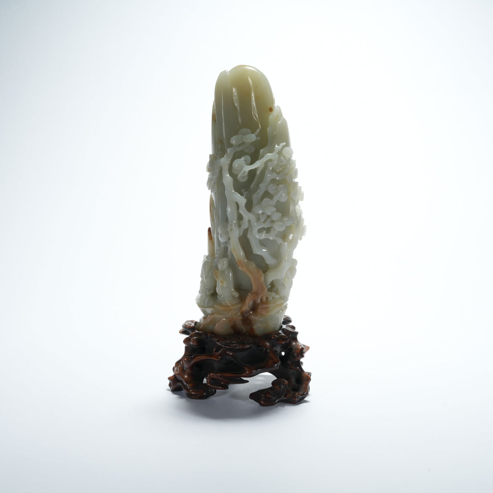 A HETIAN JADE FIGURATIVE MOUNTAIN-FORM ORNAMENT: Hetian Jade Figurative Mountain-Form Ornament