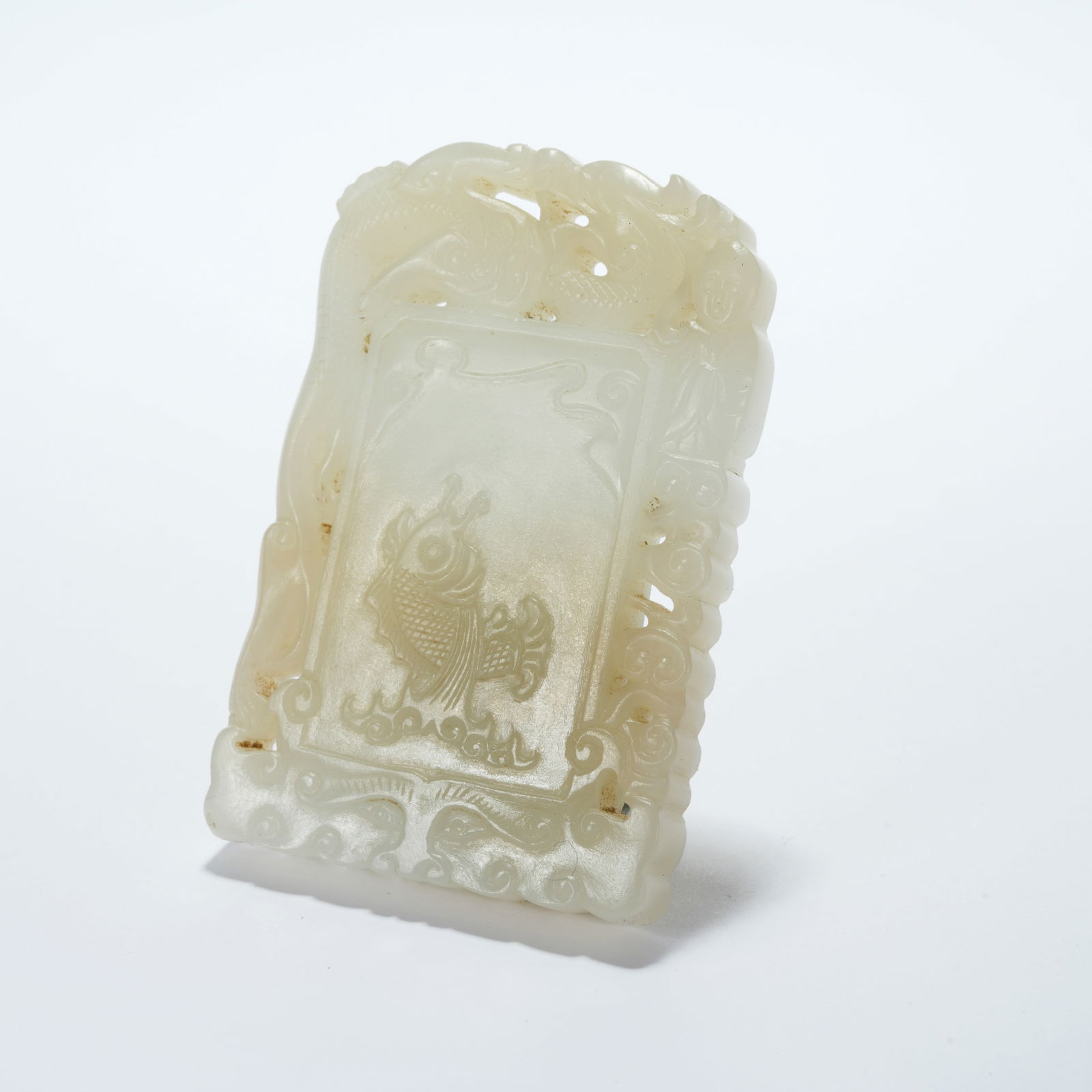 A HETIAN JADE FISH-PATTERN PLAQUE (1 of 9)