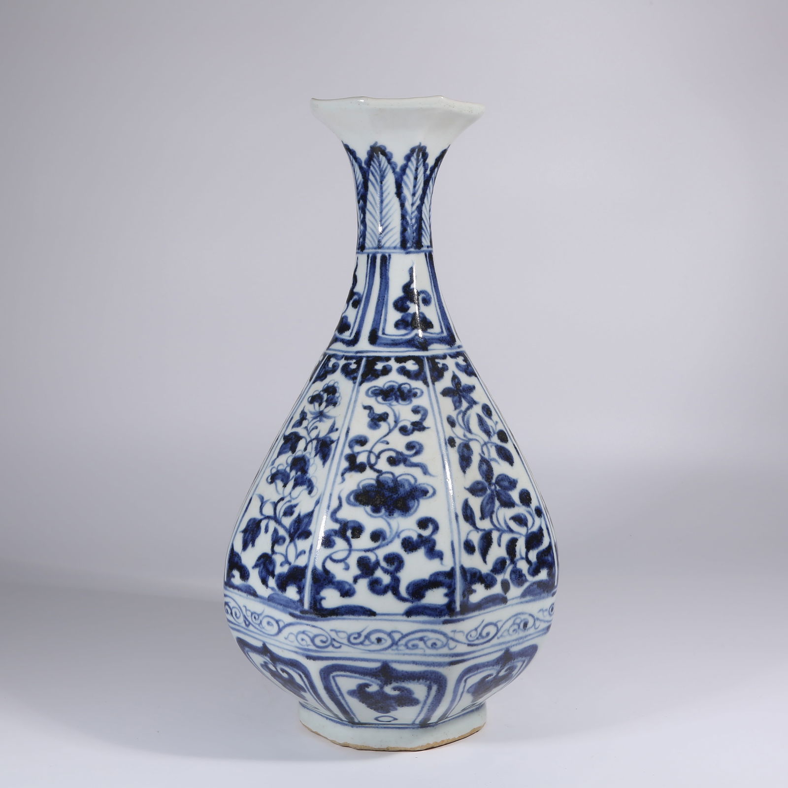 A BLUE AND WHITE EIGHT-LOBED YUHUCHUN VASE WITH FLOWERING BRANCH MOTIF: Blue and White Eight-Lobed Yuhuchun Vase with Flowering Branch Motif