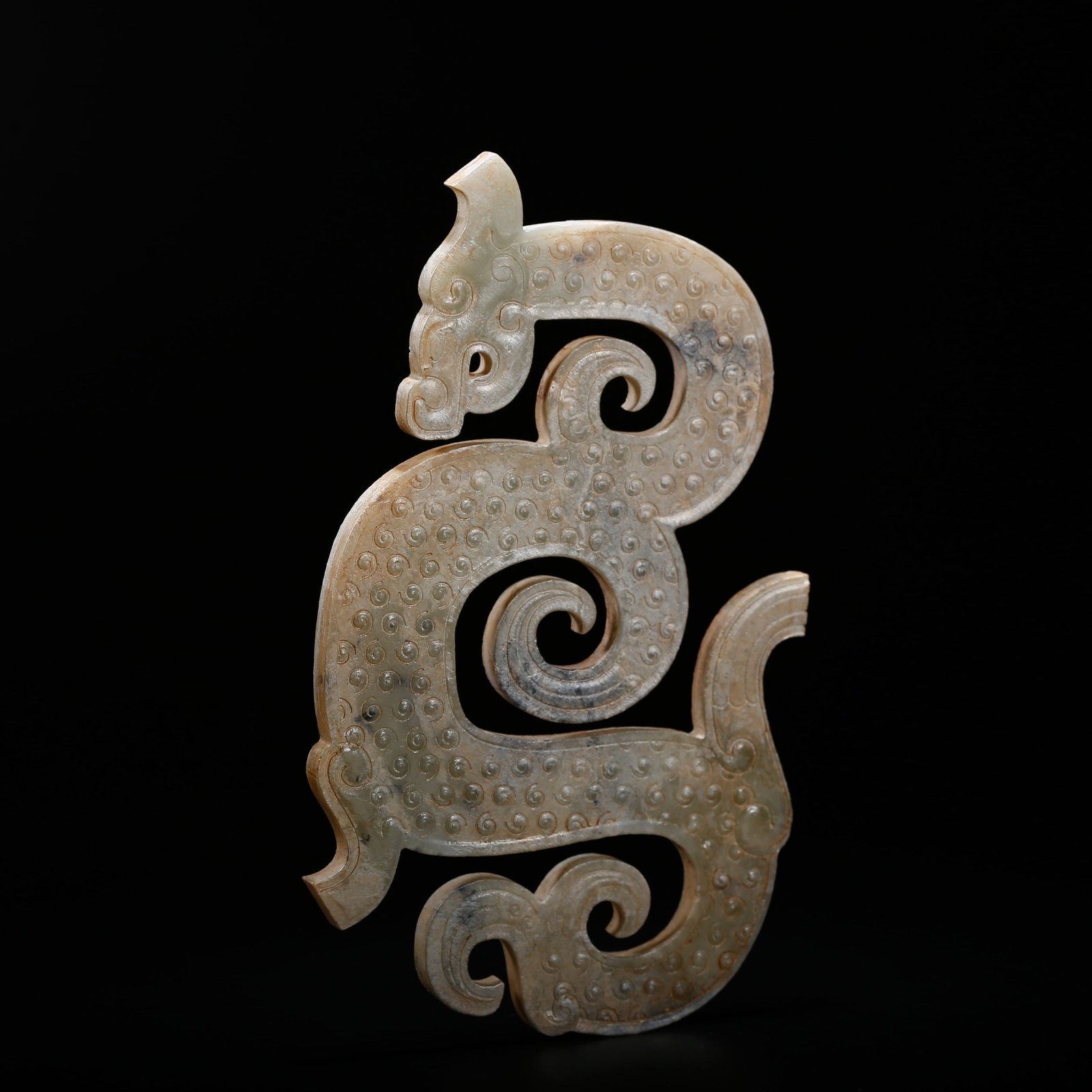AN ARCHAIC JADE DRAGON-SHAPED PENDANT: Archaic Jade Dragon-Shaped Pendant