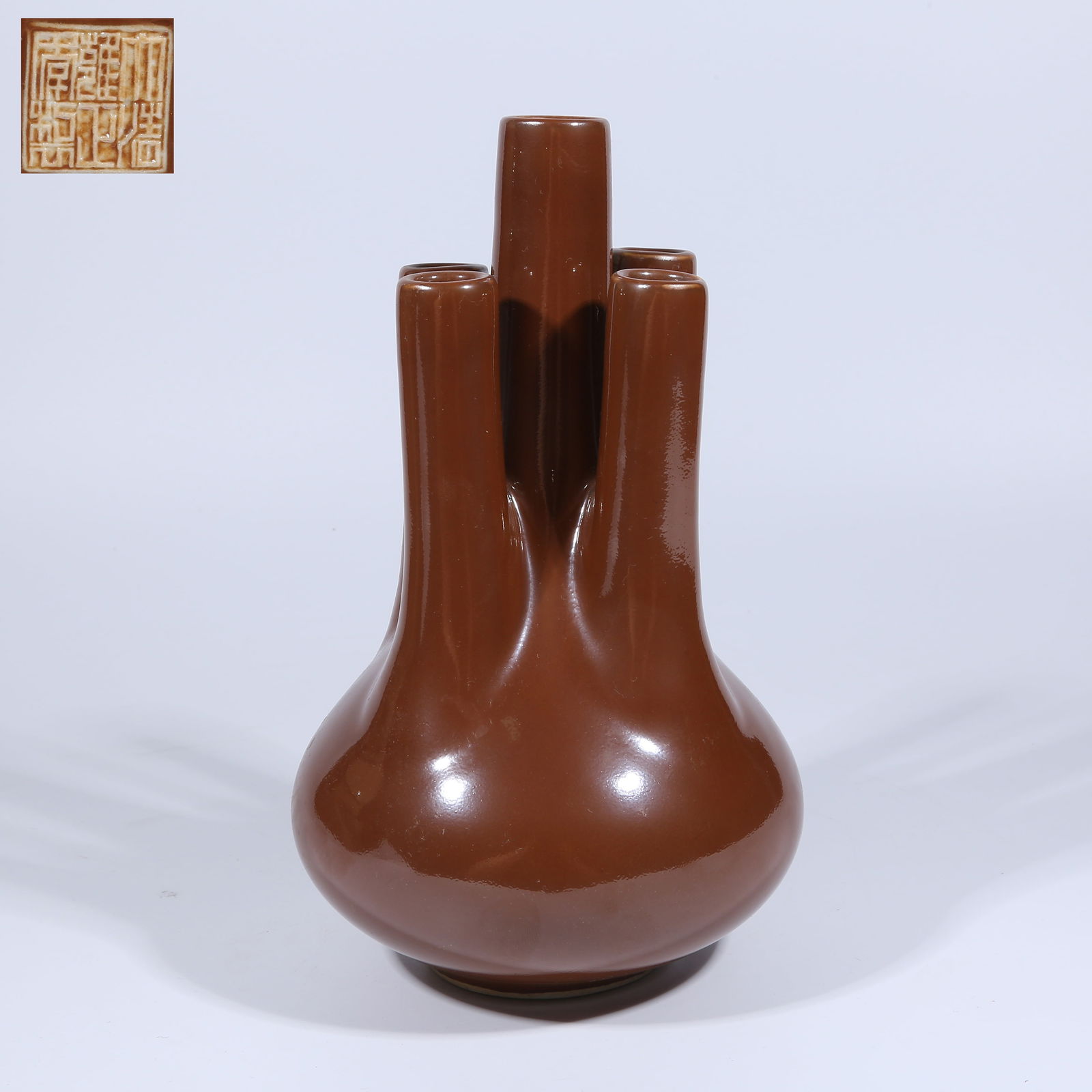 A BROWN GLAZED FIVE-NECKED VASE
