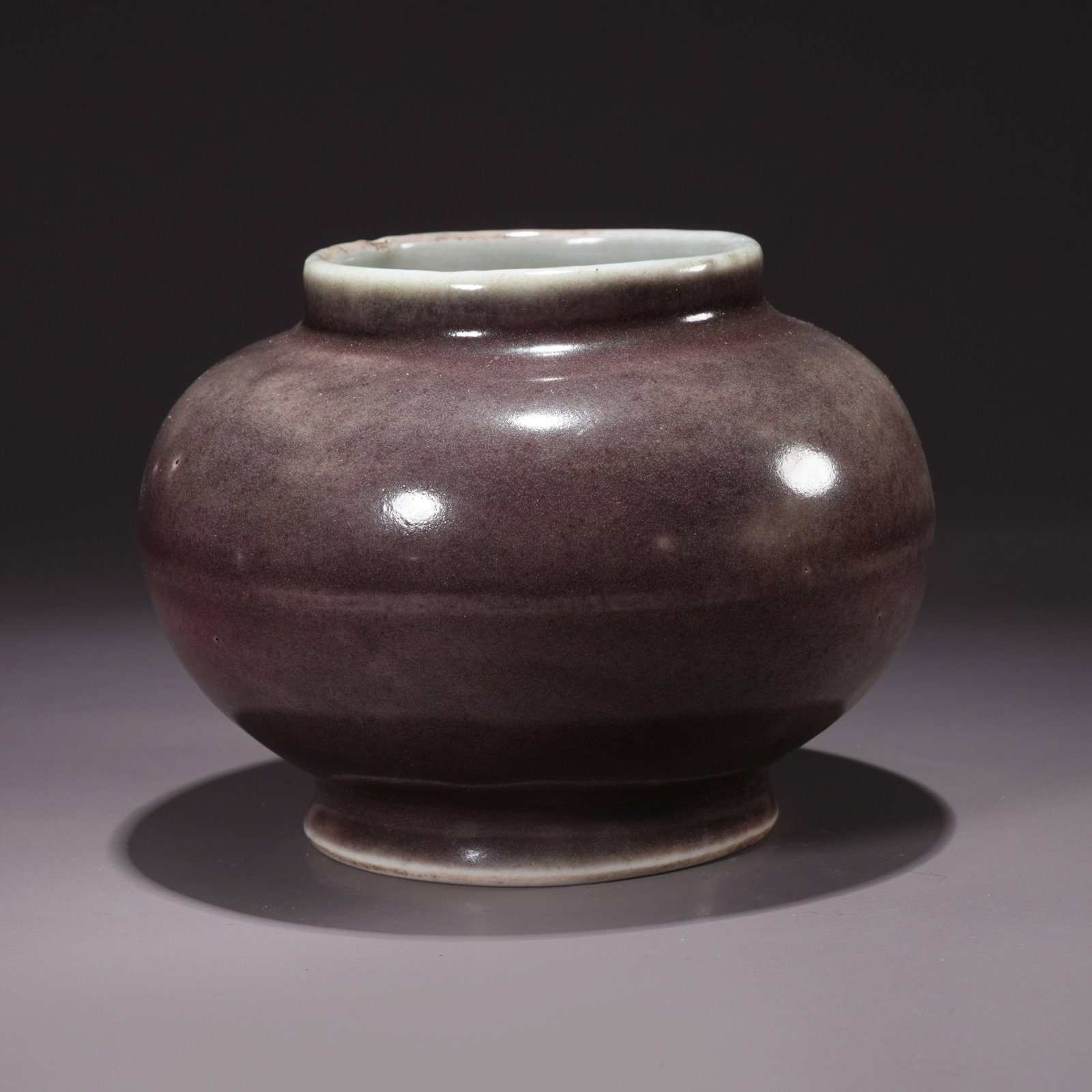 A BEAN-RED GLAZED JAR: Bean-Red Glazed Jar