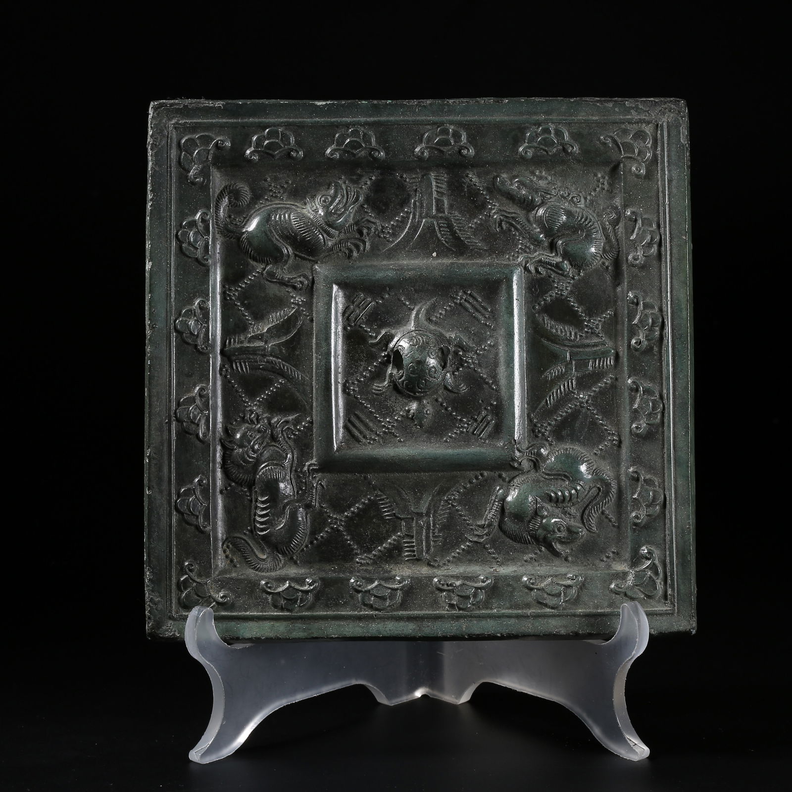 A BRONZE SQUARE MIRROR WITH BEAST-FACE PATTERN: Bronze Square Mirror with Beast-Face Pattern