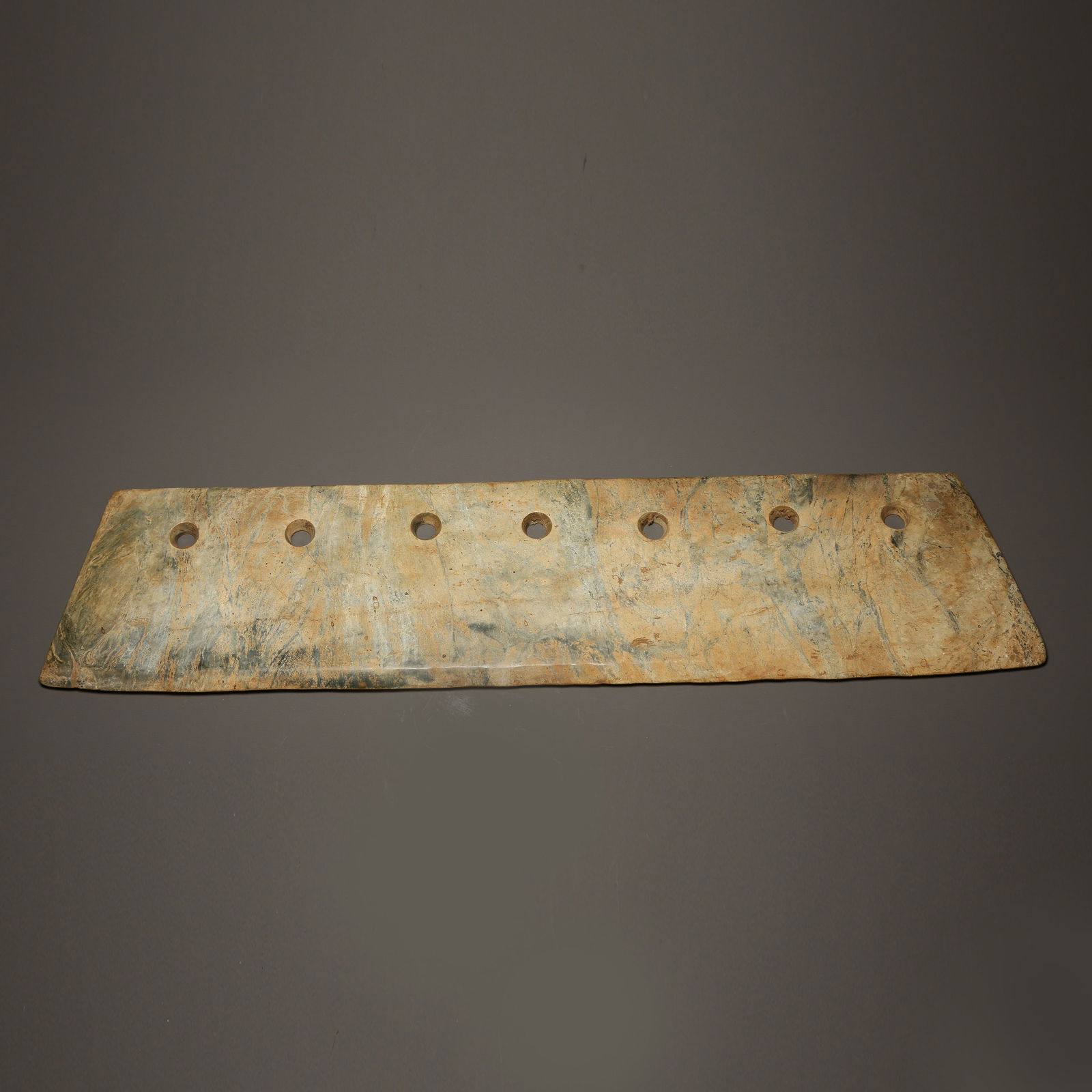 A ANCIENT JADE SEVEN-HOLED JADE KNIFE: Ancient jade seven-holed jade knife