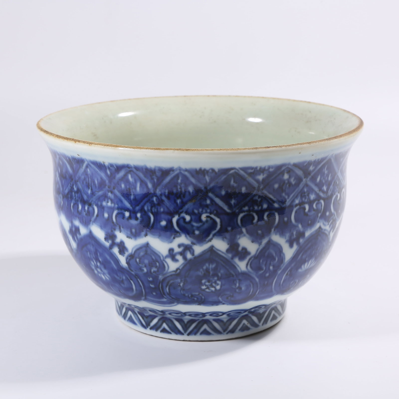 A QING DYNASTY BLUE-AND-WHITE BOWL WITH RUYI CLOUD PATTERN: Qing Dynasty Blue-and-White Bowl with Ruyi Cloud Pattern