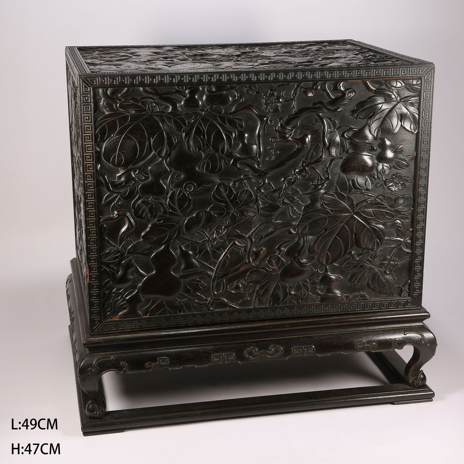 A ZITAN WOOD LIDDED BOX WITH "FORTUNE, PROSPERITY, AND ETERNITY" MOTIF: Zitan wood lidded box with "fortune, prosperity, and eternity" motif