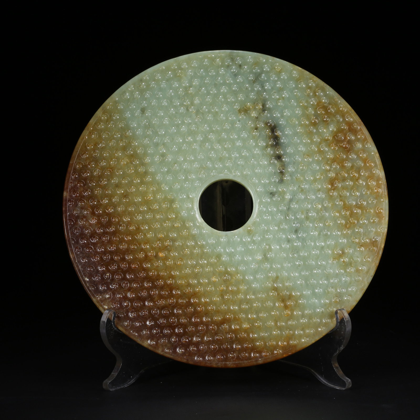 A ANCIENT JADE BI DISK WITH VALLEY PATTERN: Ancient Jade Bi Disk with Valley Pattern
