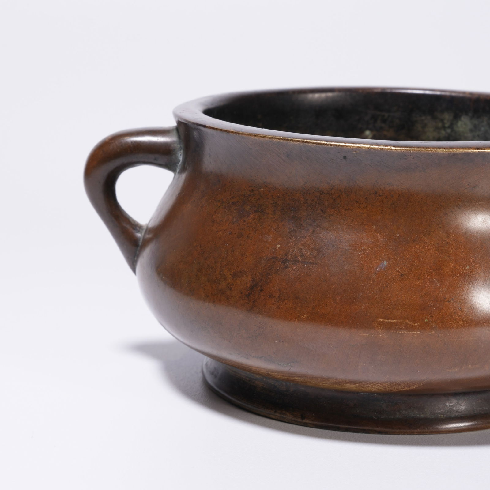 A BRONZE DOUBLE-HANDLED CENSER - 6