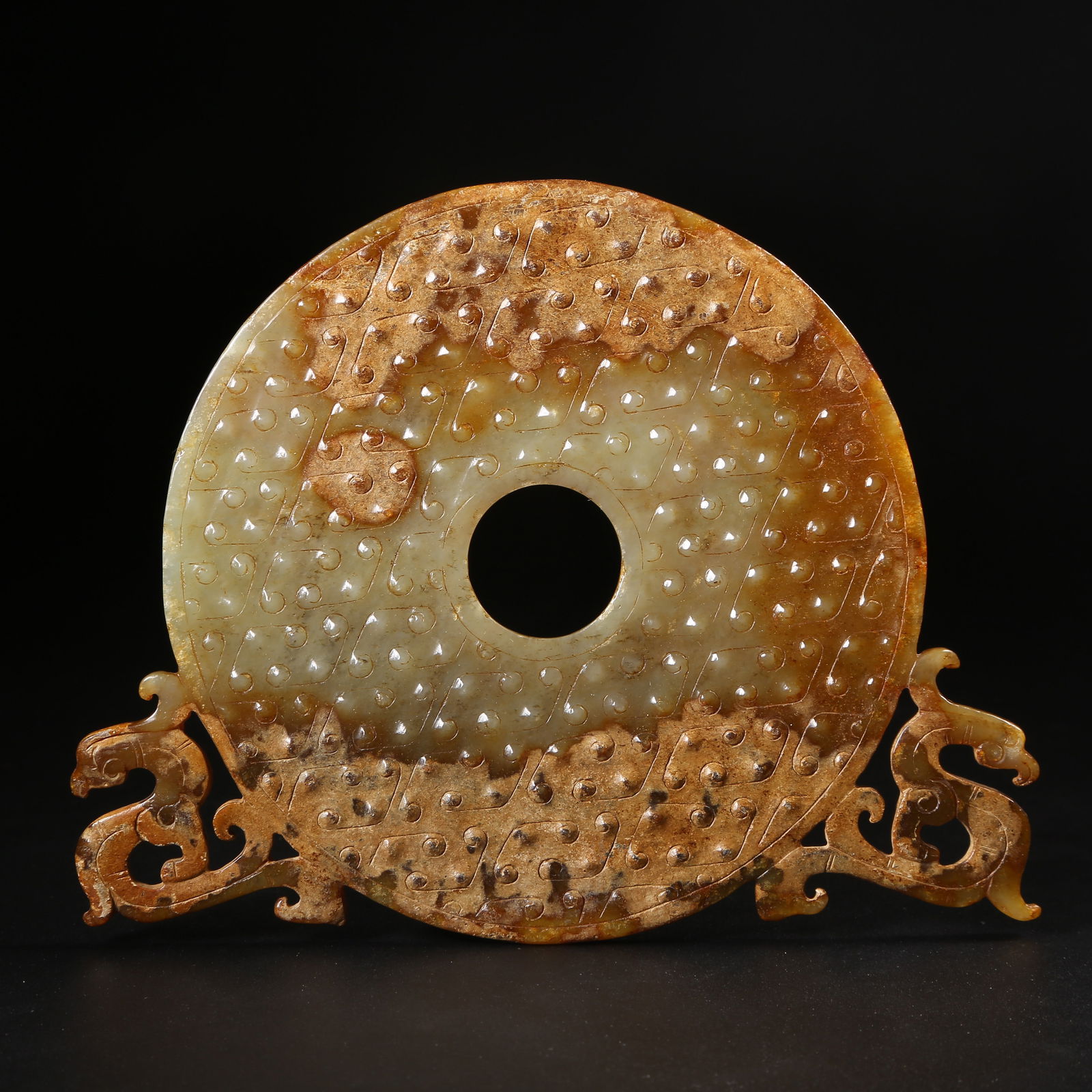 A ARCHAIC JADE DISC WITH CHI-DRAGON MOTIF (1 of 8)