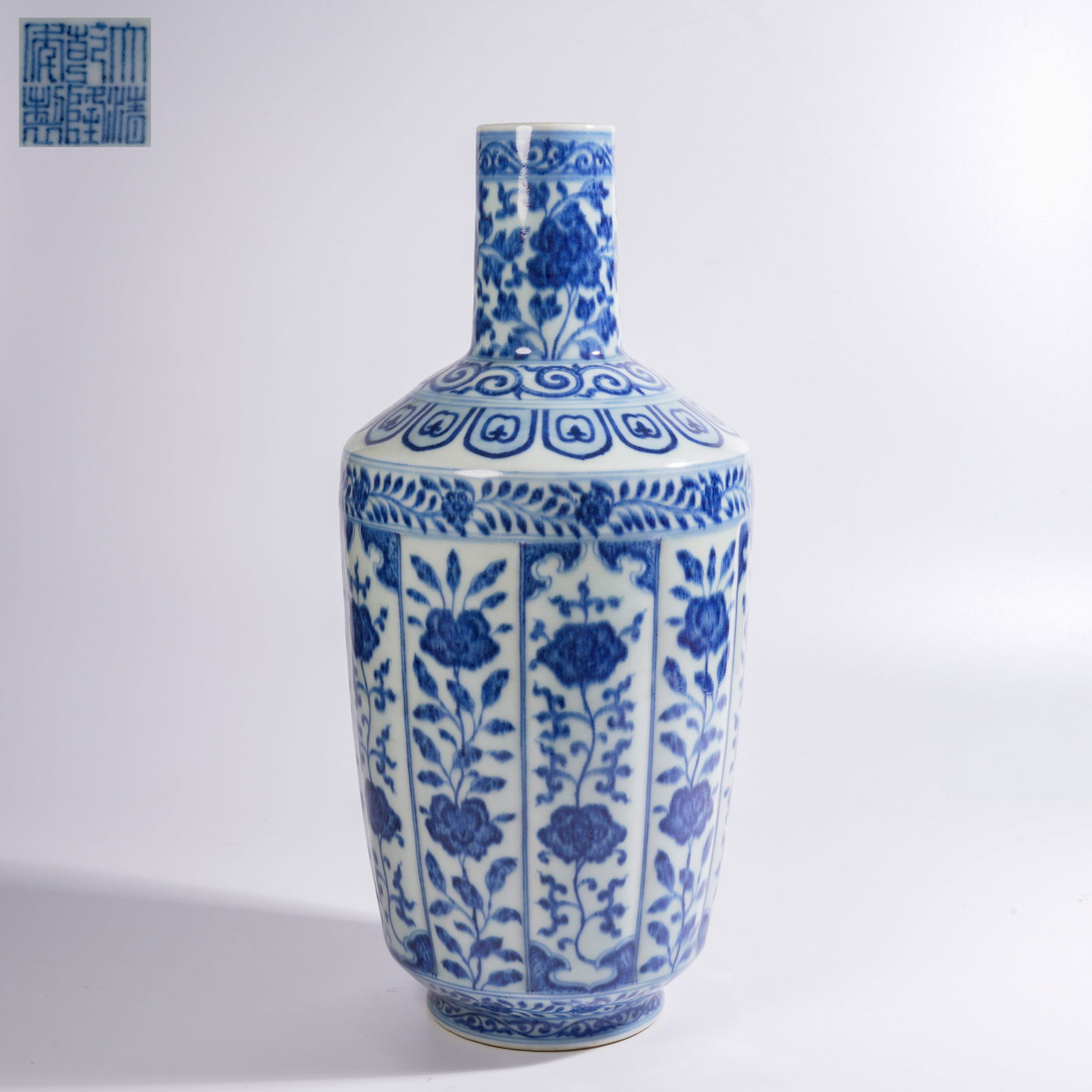 A BLUE-AND-WHITE VASE WITH FLORAL MOTIFS (1 of 9)