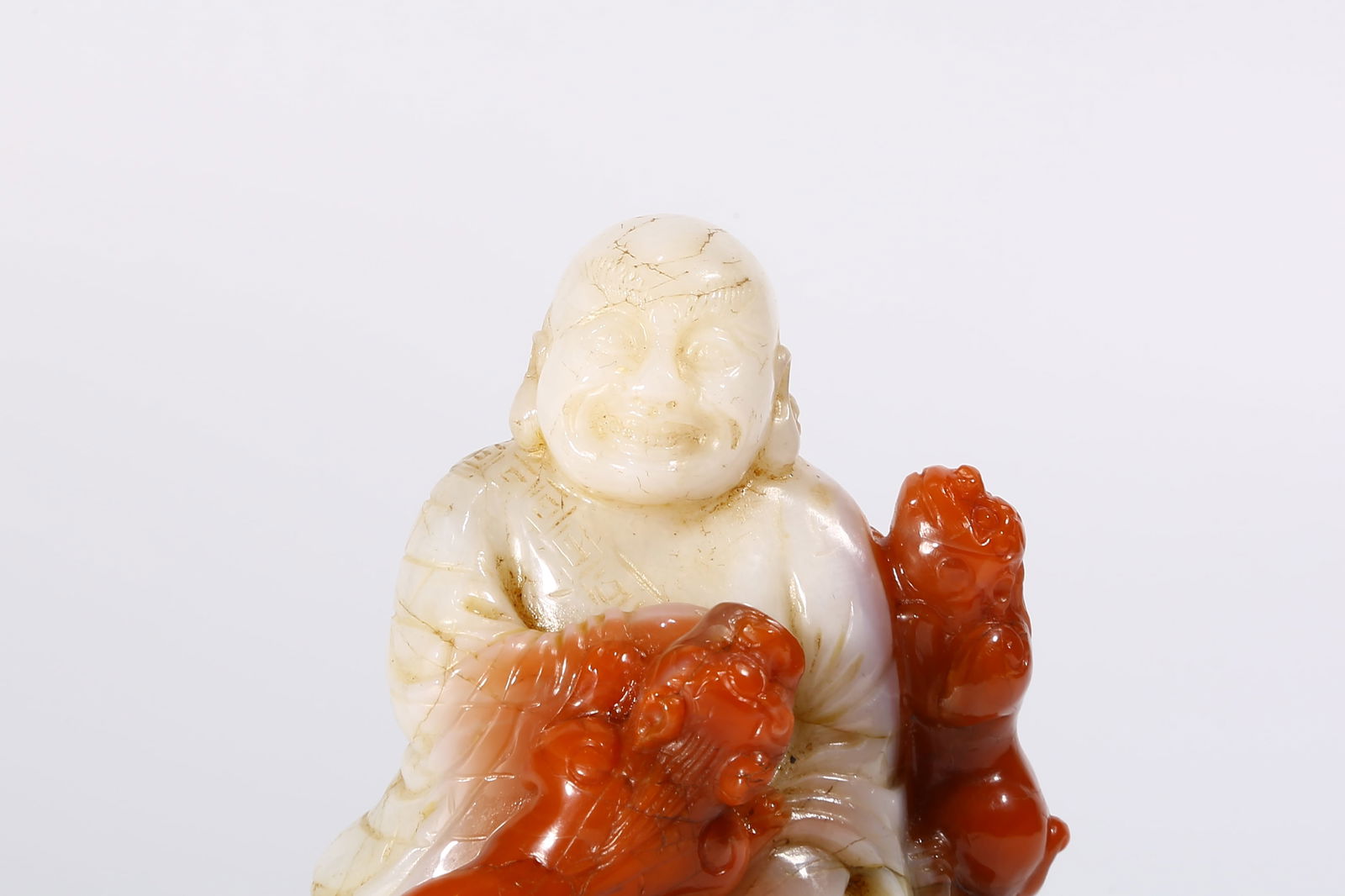 A CARNELIAN ARHAT STATUE - 2