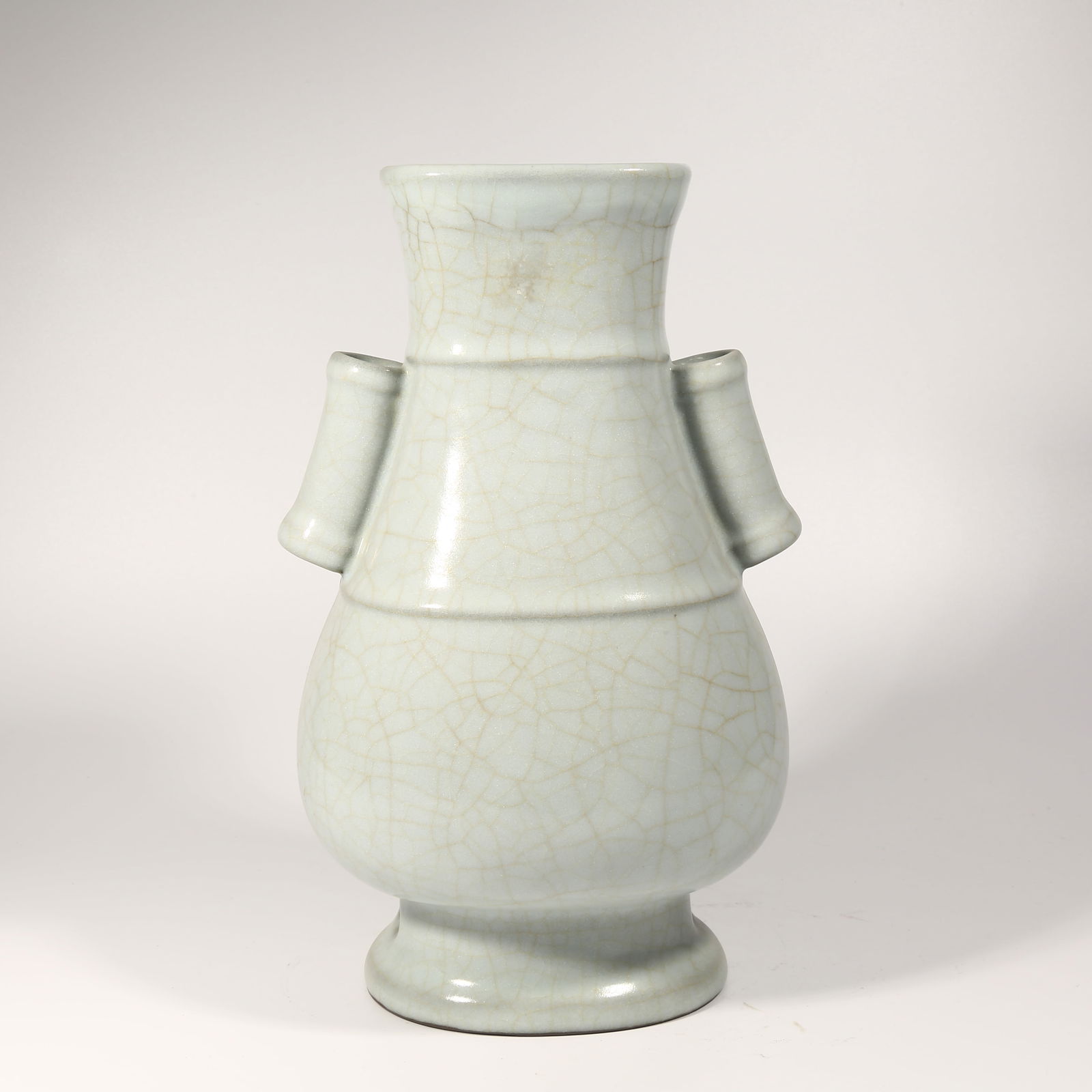 A OFFICIAL KILN LOOP-HANDLED VASE: Official Kiln Loop-Handled Vase