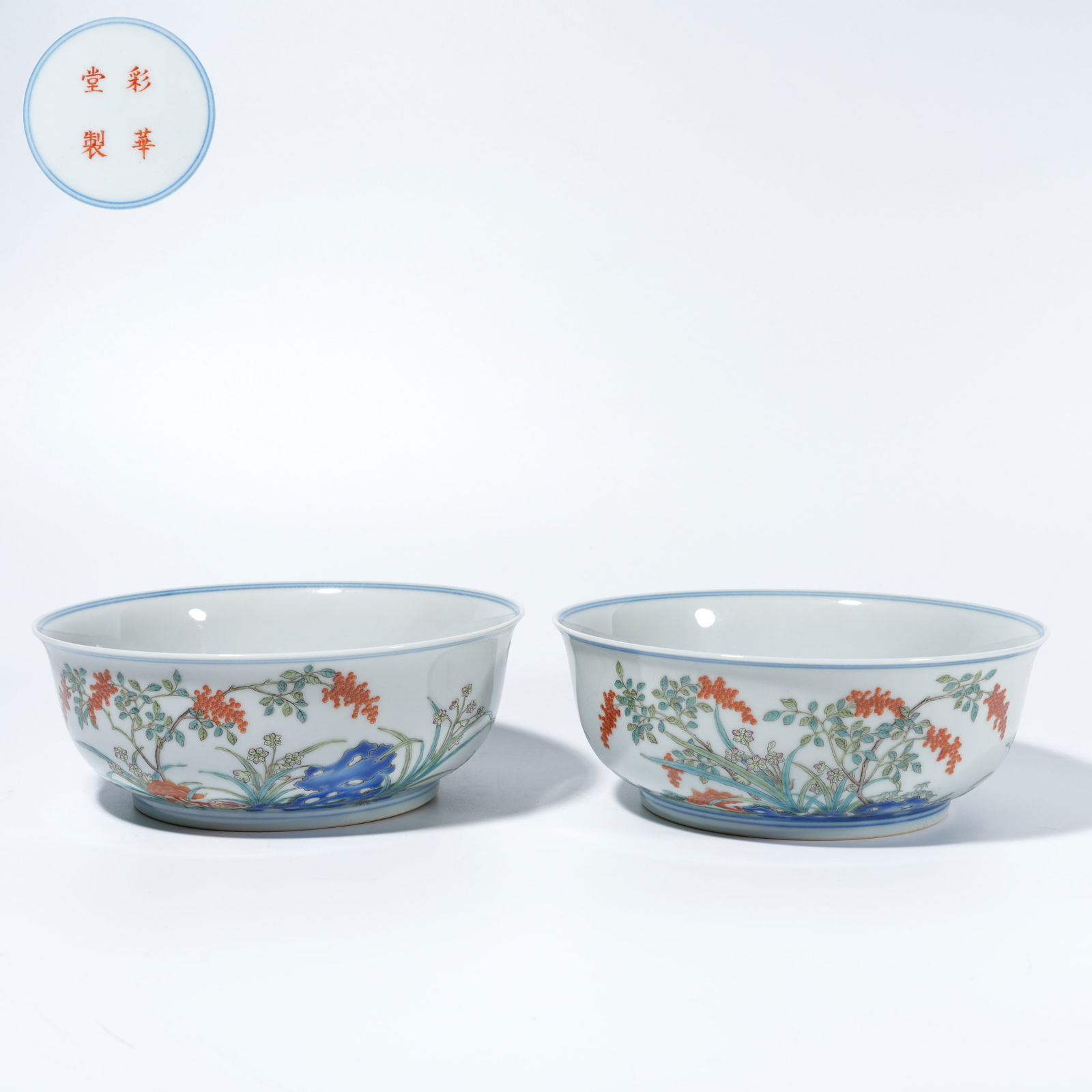 A FAMILLE-ROSE BOWL WITH SCHOLAR'S ROCK AND FLOWER MOTIF (PAIR): Famille-Rose Bowl with Scholar's Rock and Flower Motif (Pair)