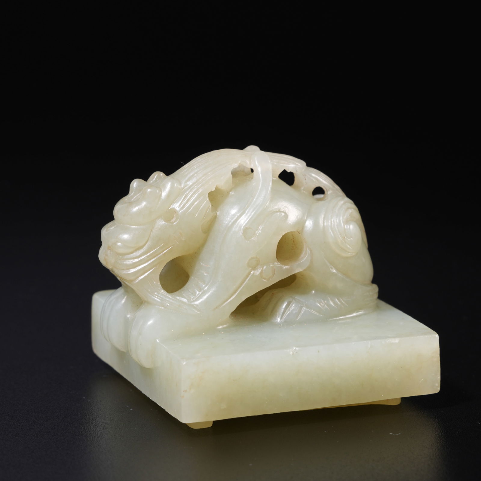 A HETIAN JADE CARVED DRAGON FINIAL SEAL (1 of 8)