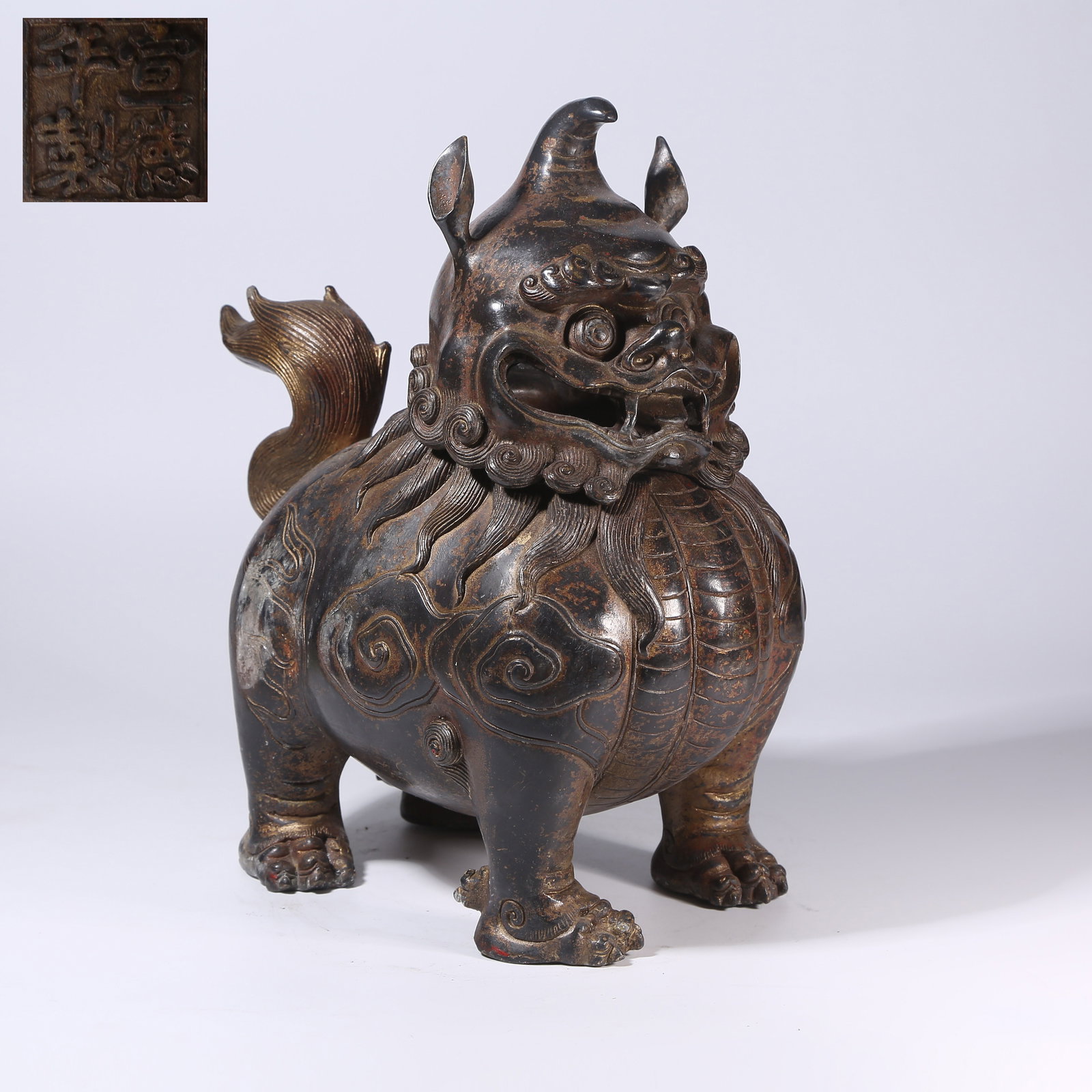 A GILT-BRONZE AUSPICIOUS BEAST INCENSE BURNER: Gilt-Bronze Auspicious Beast Incense Burner