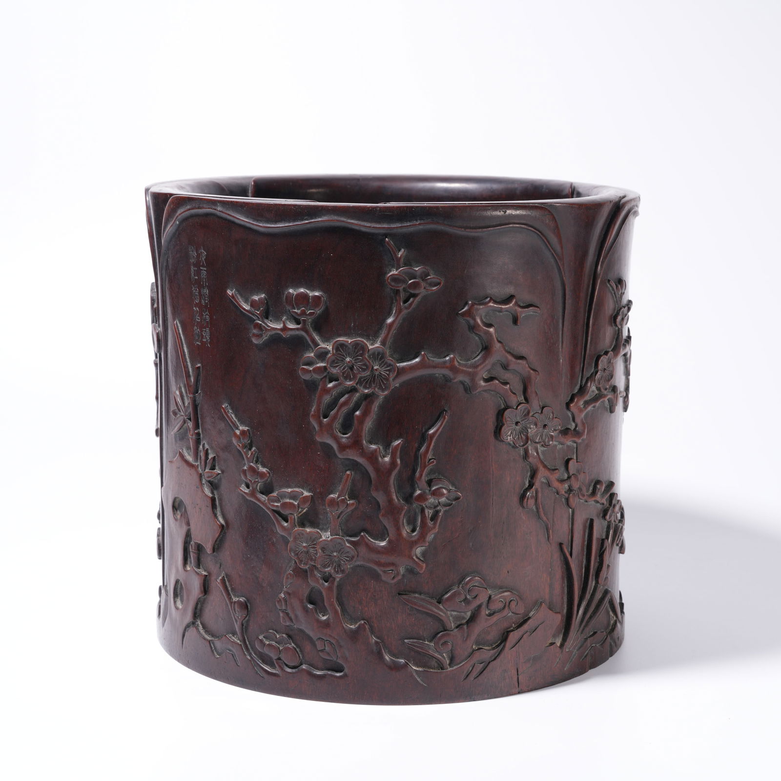 A ZITAN WOOD CARVING PLUM BLOSSOM-PATTERN BRUSH HOLDER: Zitan Wood Carving Plum Blossom-Pattern Brush Holder