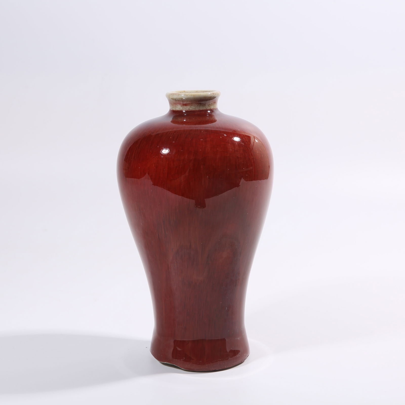 A QING DYNASTY LANG KILN RED-GLAZE MEIPING VASE: Qing Dynasty Lang Kiln Red-Glaze Meiping Vase