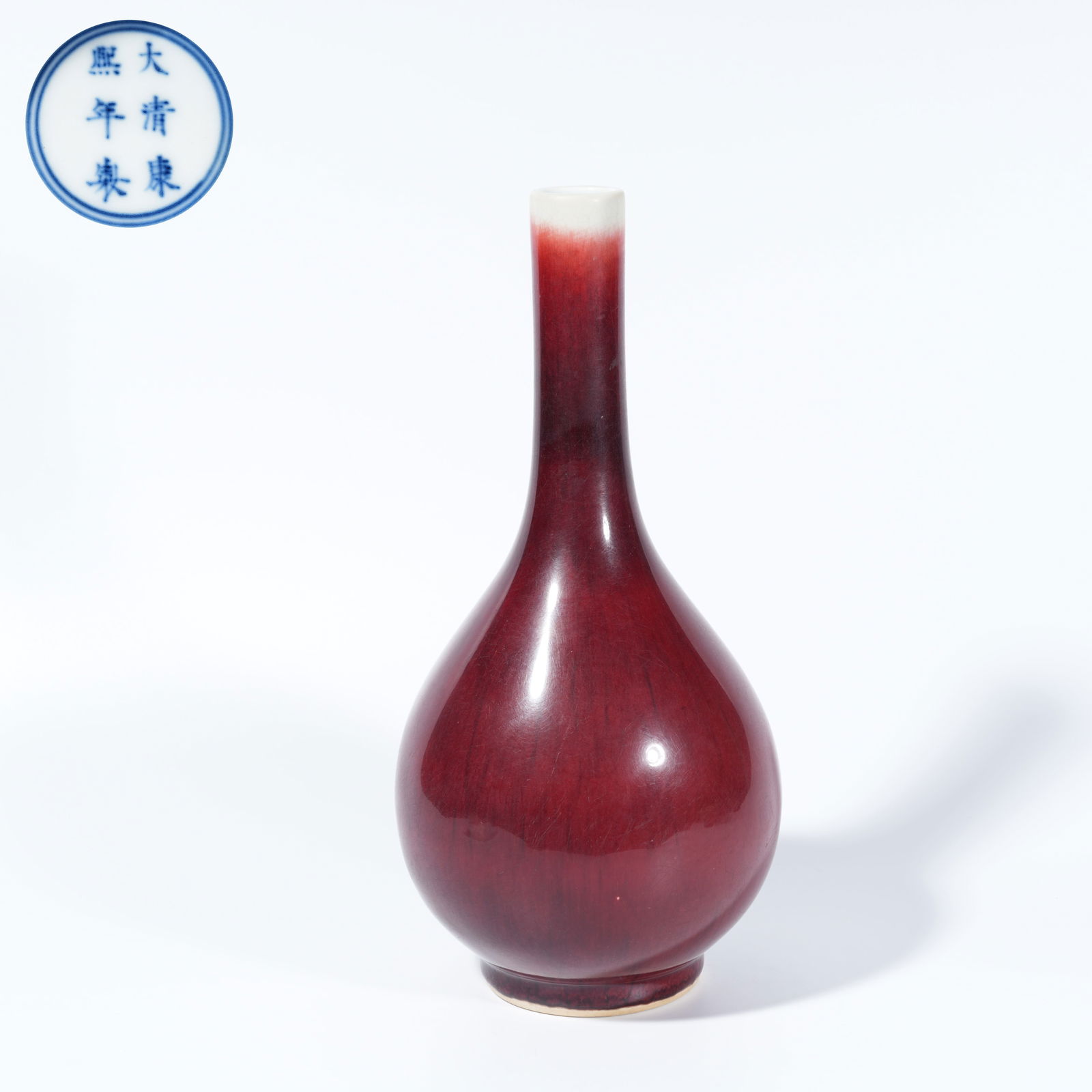 A RED-GLAZED DAN VASE: Red-glazed dan vase