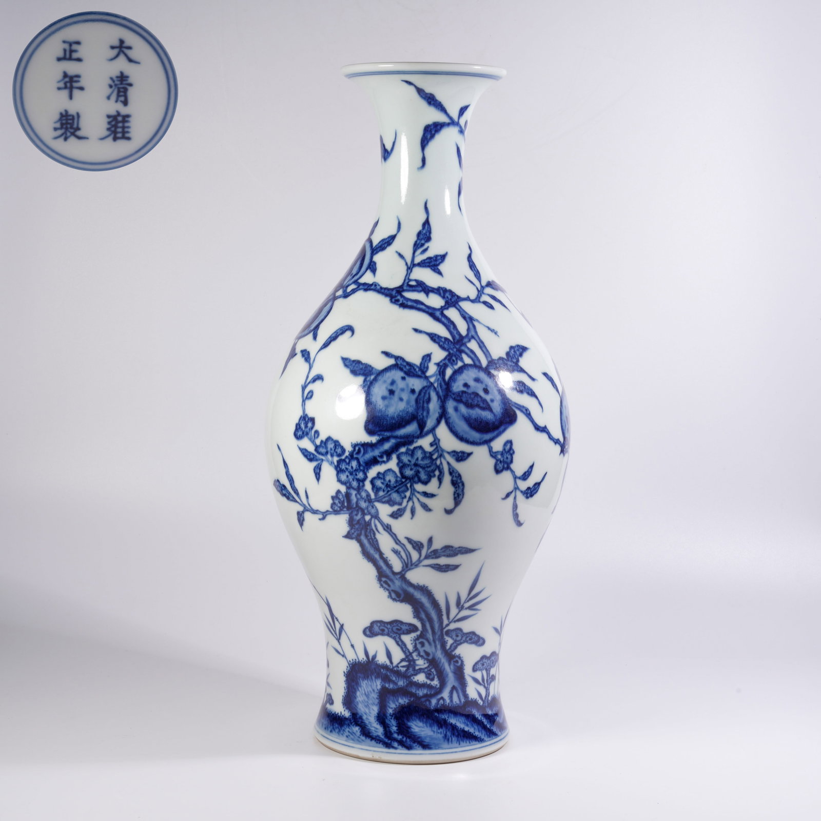 A BLUE-AND-WHITE VASE WITH AUSPICIOUS FRUIT MOTIFS AND FLARED MOUTH (1 of 9)