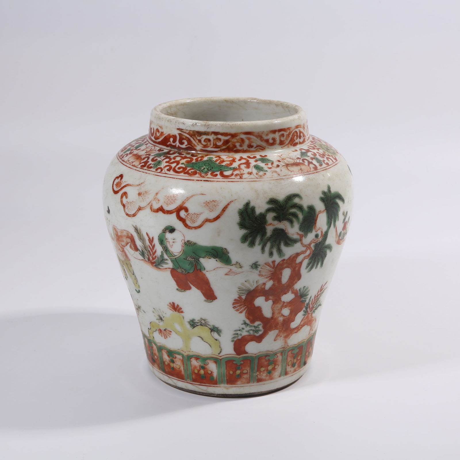 A QING DYNASTY WUCAI JAR WITH CHILDREN AT PLAY PATTERN: Qing Dynasty Wucai Jar with Children at Play Pattern