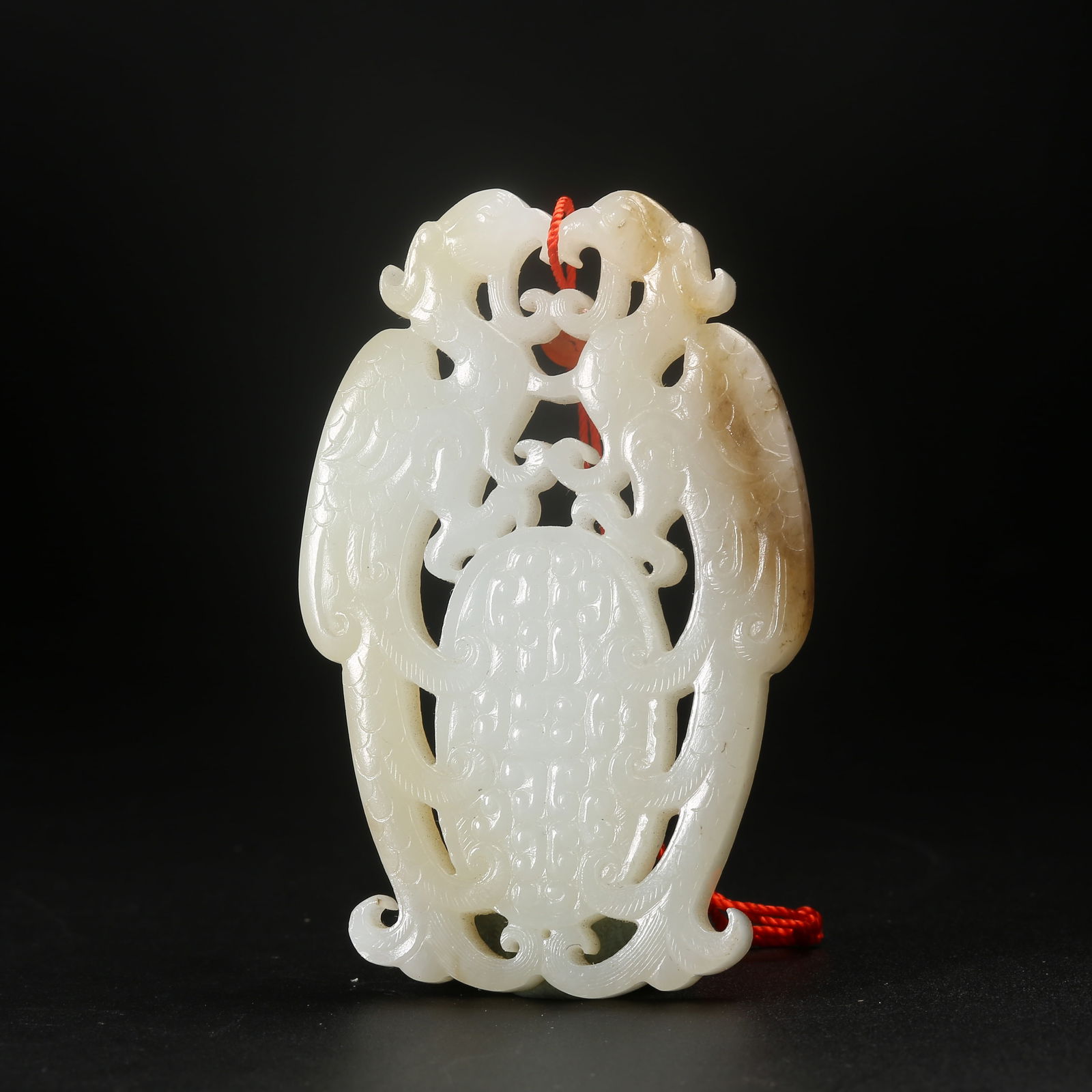 A ARCHAIC JADE DOUBLE-PHOENIX PENDANT (1 of 8)