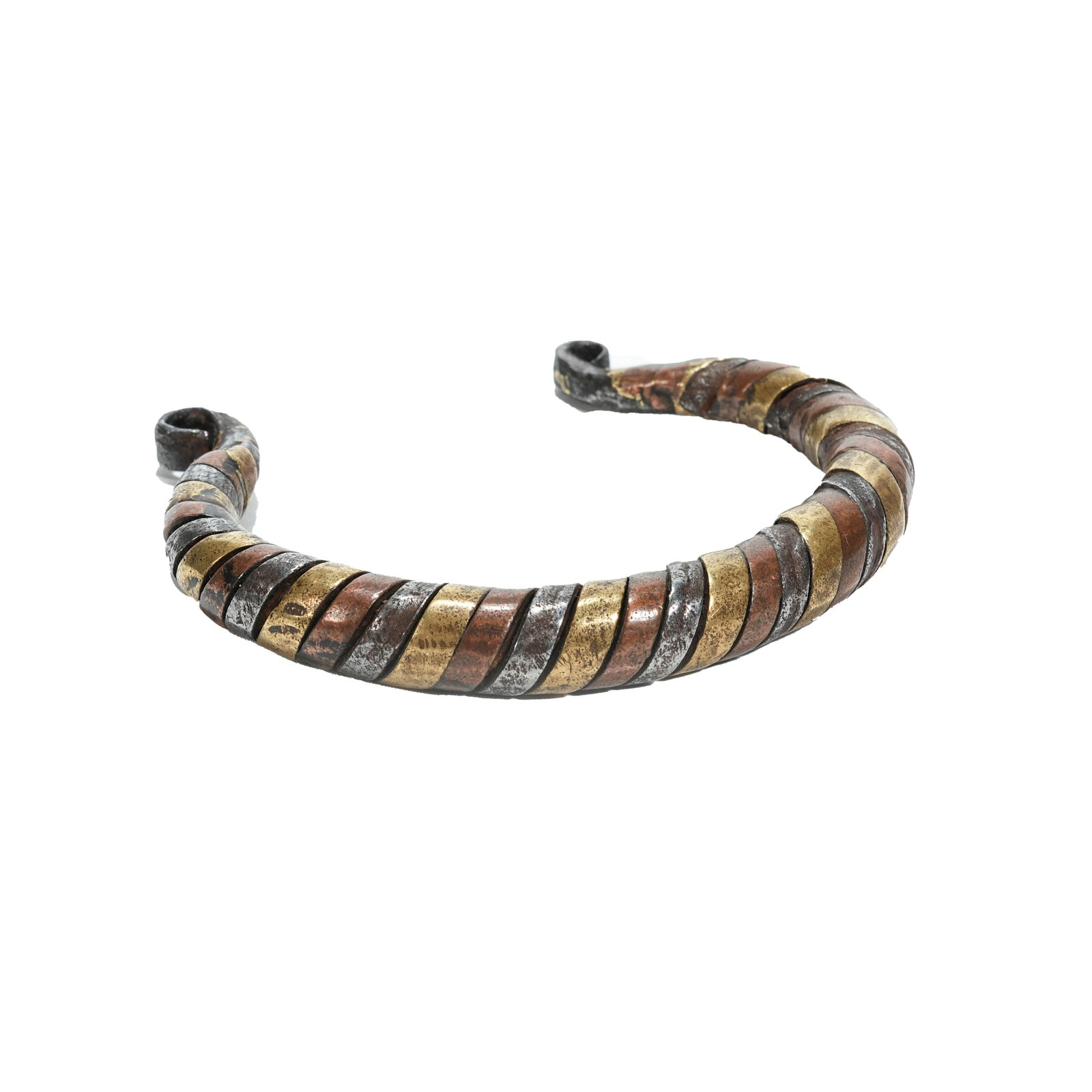 IRON BRACELET INLAID WITH GOLD, SILVER AND BRONZE, QING DYNASTY: Traditional three-color metal bracelet from Tibetan regions is made with iron as the base, adorned with gold, silver and red bronze inlay techniques. Three kinds of metal wires are intertwined spirall