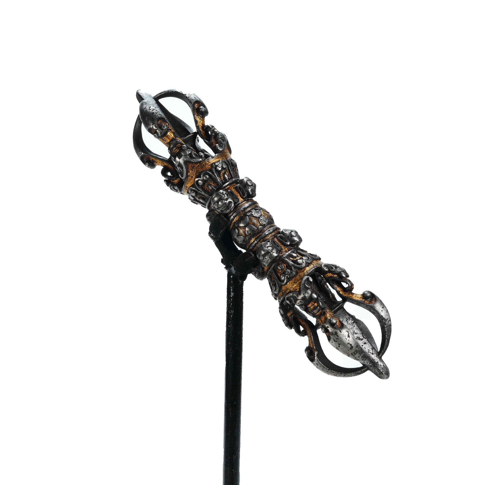 IRON GILT FIVE-PRONGED VAJRA PESTLE, QING DYNASTY: A ritual implement of Tibetan Buddhism, it is cast from refined iron and fully finished with gold damascening craft, presenting subdued noble luster and antique aged patina. The middle section of the 