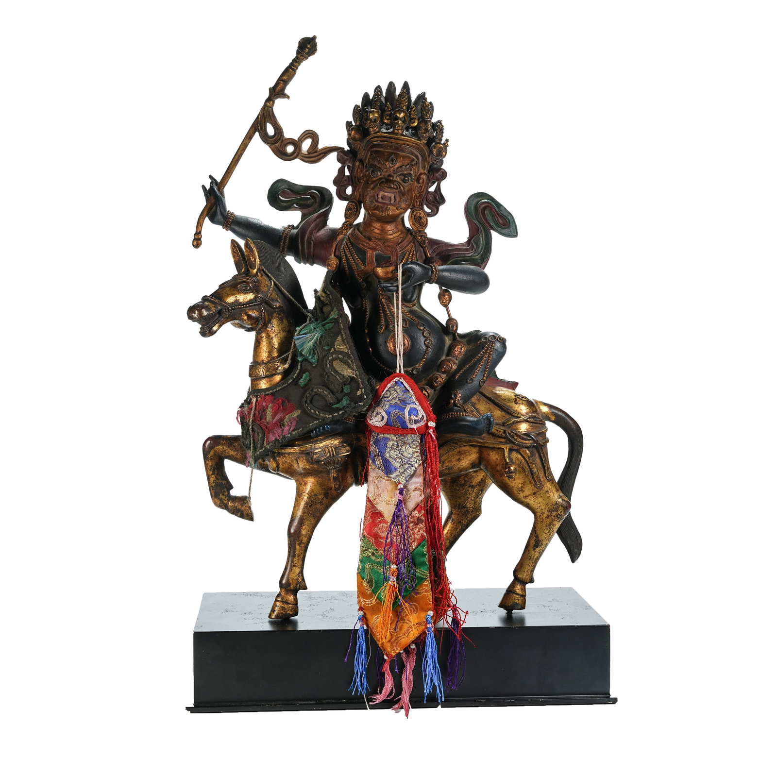 PAINTED GILT BRONZE STATUE OF PALDEN LHAMO RIDING MULE, QING DYNASTY: This is a statue of a highly revered guardian deity in Tibetan Buddhism, cast from fine bronze with the divine mule fully gilded, while the deity's body and head are decorated with mineral pigments. I