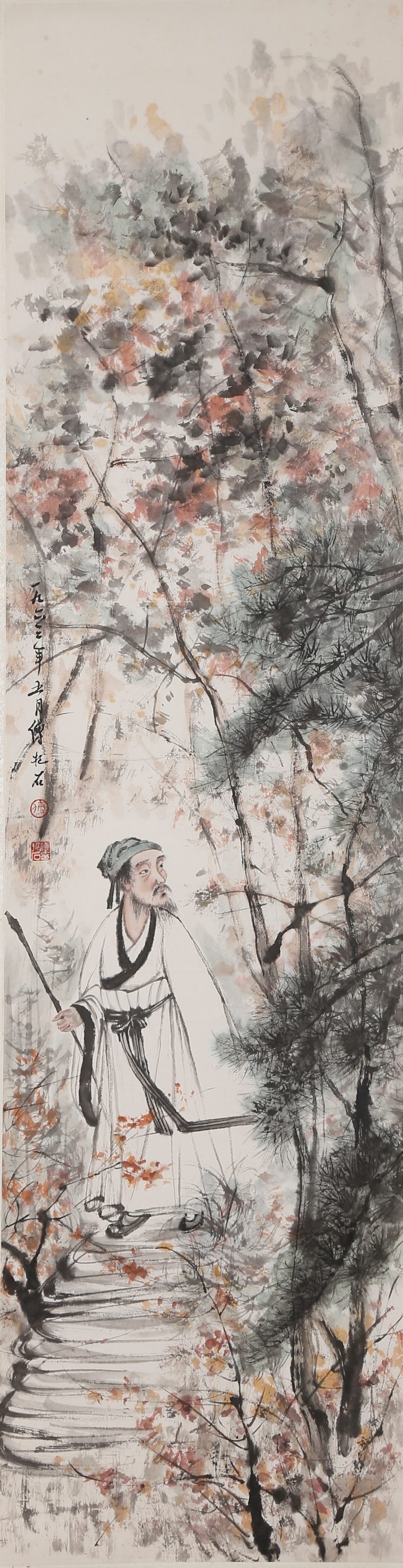 WALKING WITH STAFF IN AUTUMN FOREST PAPER PAINTING BY FU BAOSHI.傅抱石: This is a typical figure landscape painting by Fu Baoshi, a great master of modern Chinese painting. It depicts an eminent scholar walking with a cane in autumn woods, embodying his painting style at 